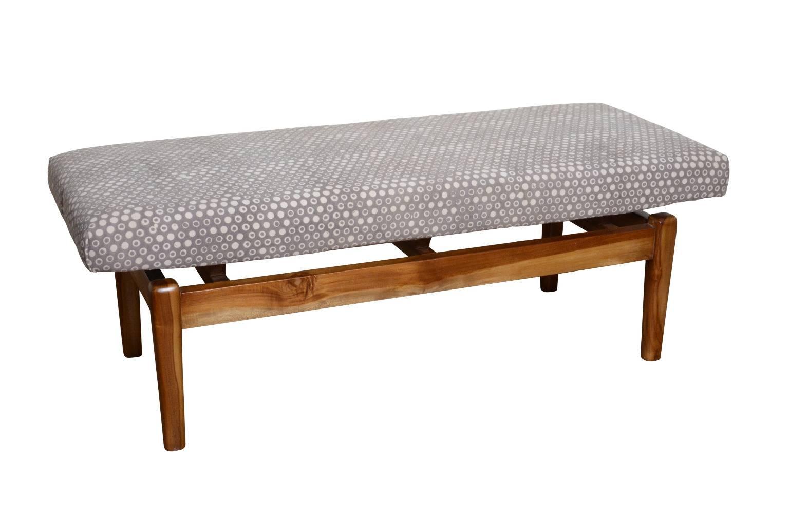 Contemporary teak bench upholstered in kashish dyed cotton. Kashish is a natural dye that produced tones in the grey to brown range, this fabric is beautiful hand block-printed cotton sourced from India. 


   