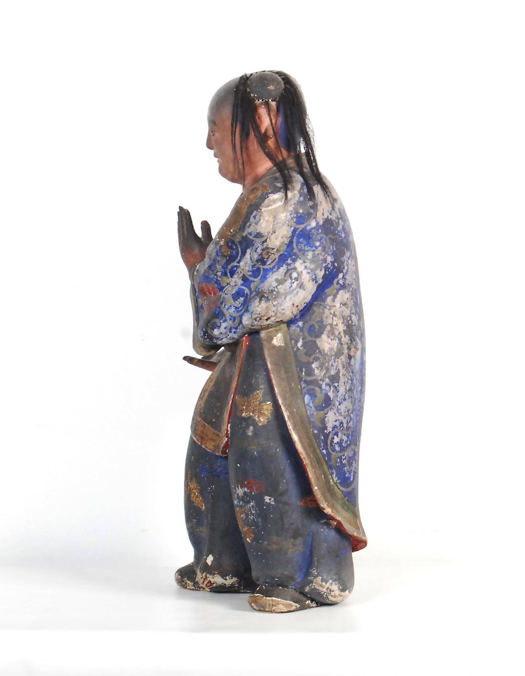 Rare Japanese antique statue of a Chinese child performing Tai chi capturing the pose in motion. Middle Edo period, circa 1750. Made from polychrome on carved cypress.

Dimensions: H 60 cm x W 30 cm x D 20 cm.