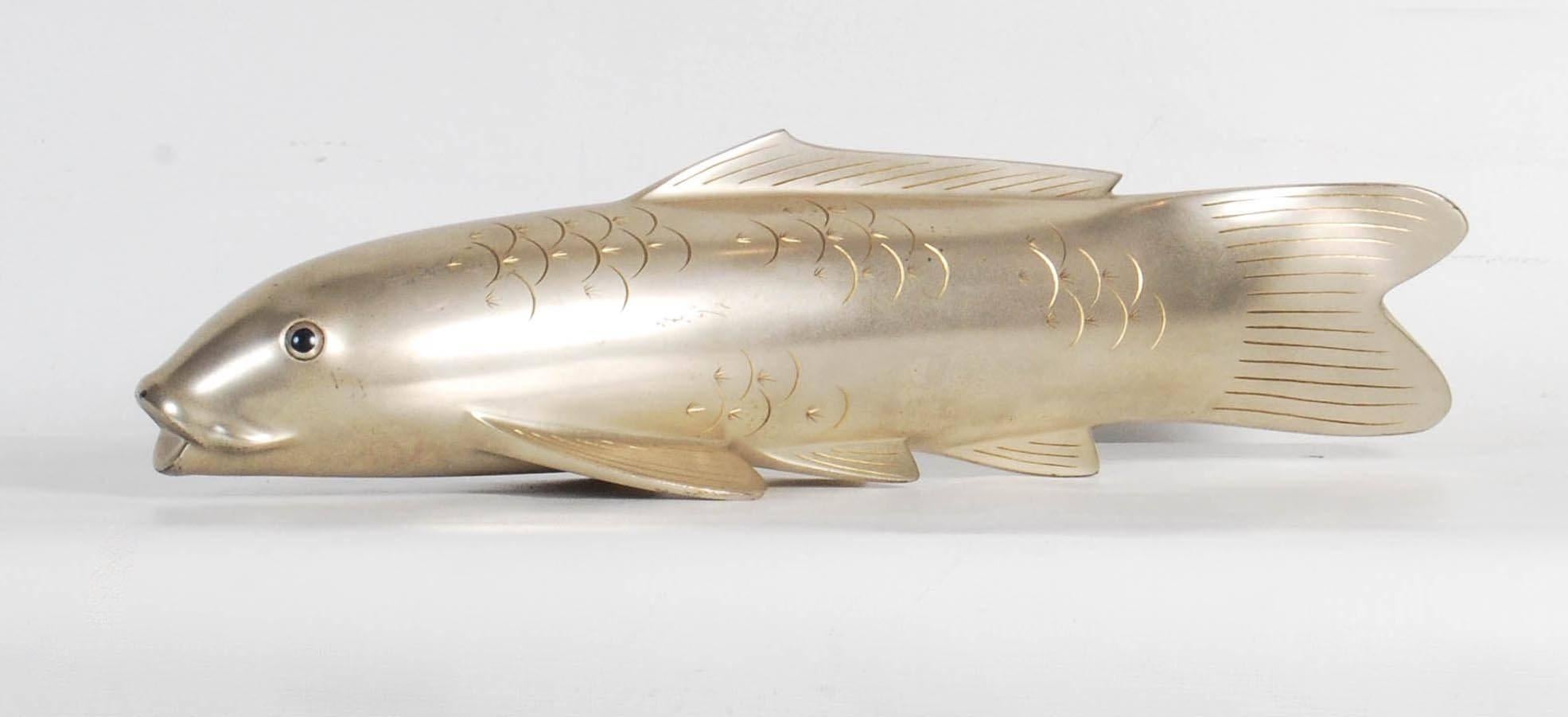 Japanese silvered bronze model of a carp by the known bronze artist Hiroharu Hiramatsu (1896-1971) with hand chased details in its fins and scales, inset and enameled eyes and the signature 'Hiroharu' inscribed on its underside.

Complete with its