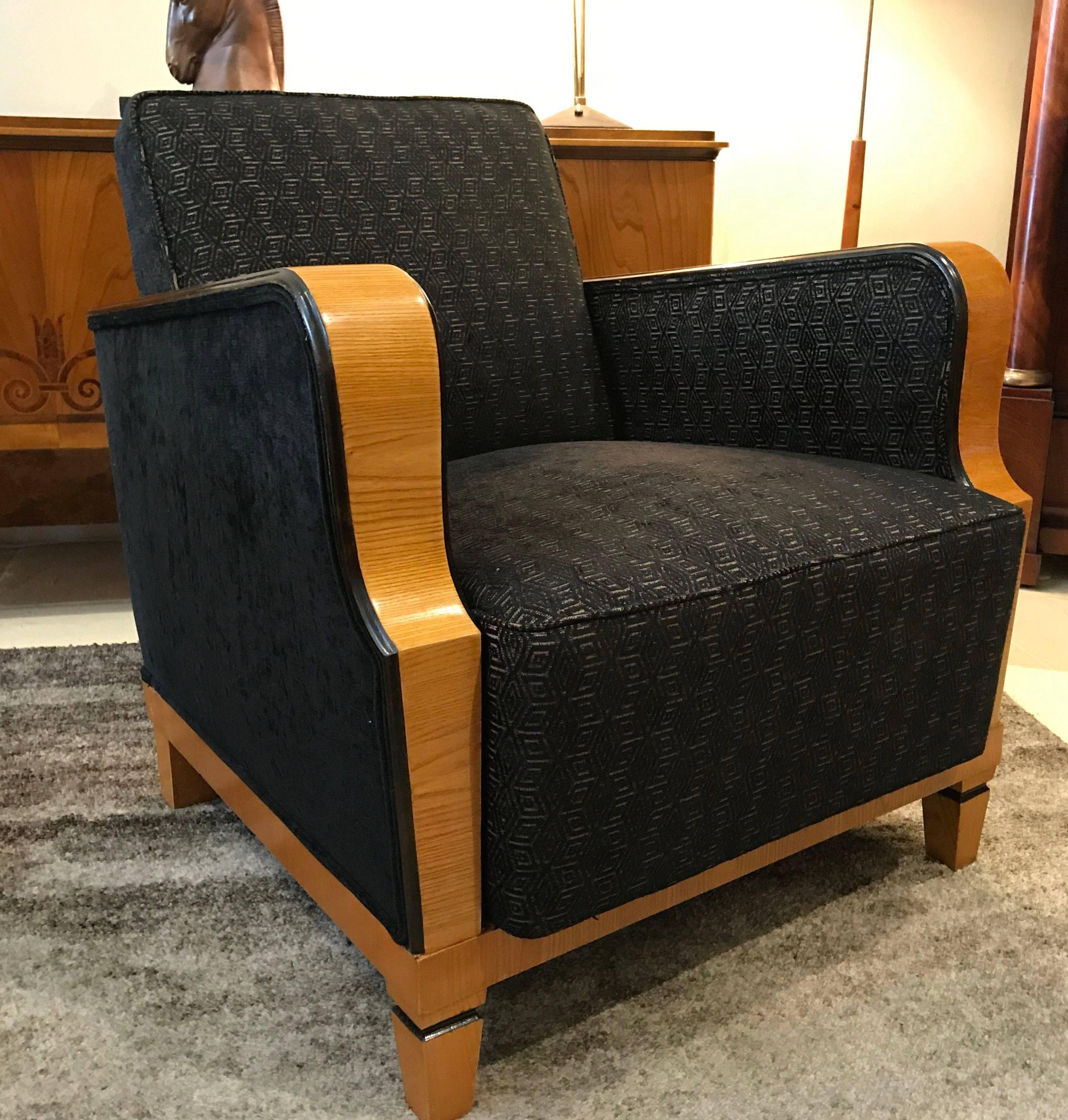 Pair of Art Deco armchairs with elm and stained birch arm rests. Re upholstered in an Art Deco inspired chenille fabric. Fully sprung through the backs and seats, these chairs are very comfortable.