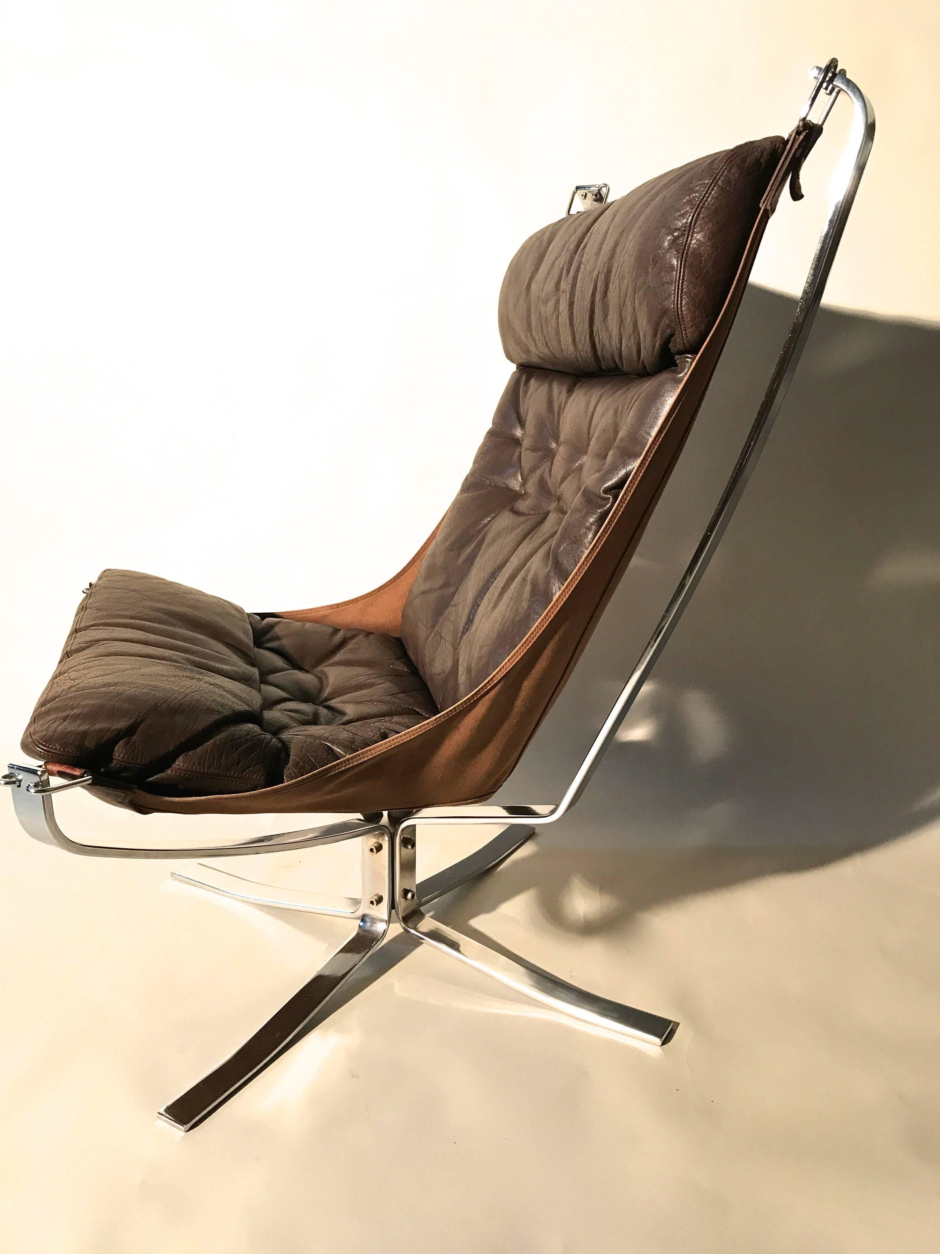 Rare chromed steel and chocolate leather high back falcon chair. The Chrome leather and canvas are all in excellent original condition.
The high back gives an added level of comfort.
   