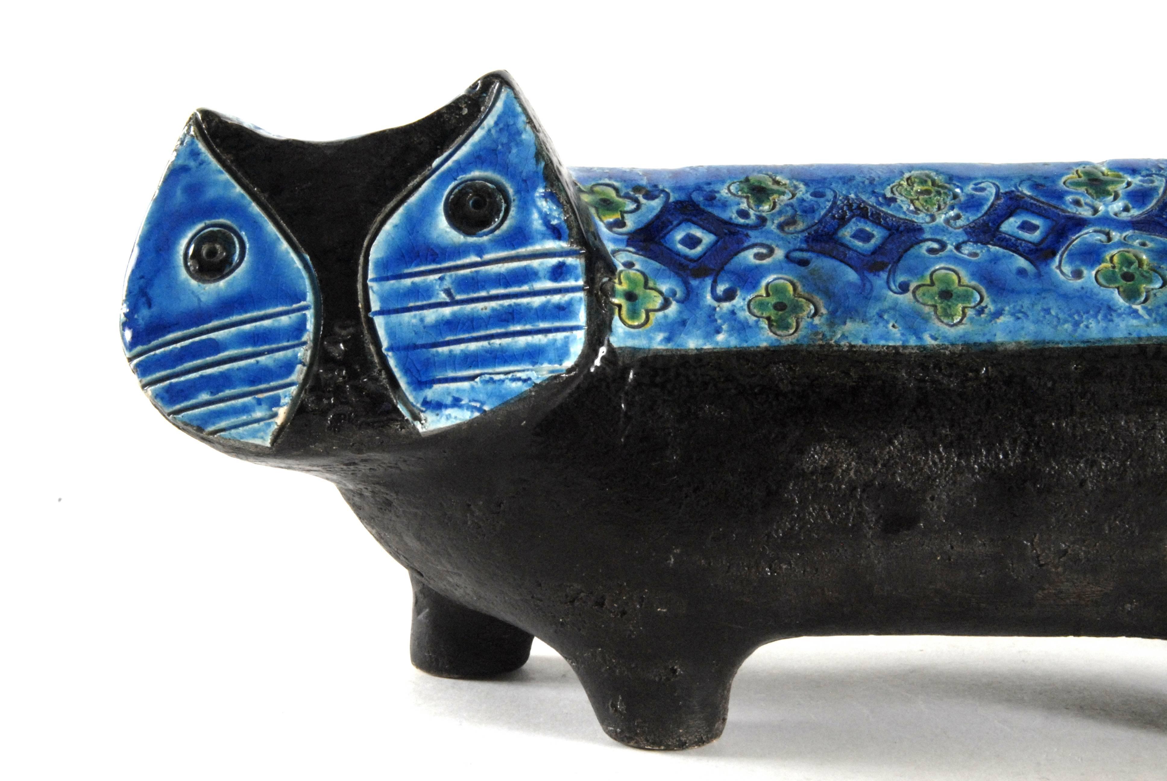 Two-tone side on facing cat with blue 'Spanish' pattern design. Signed on the base, in brilliant condition.