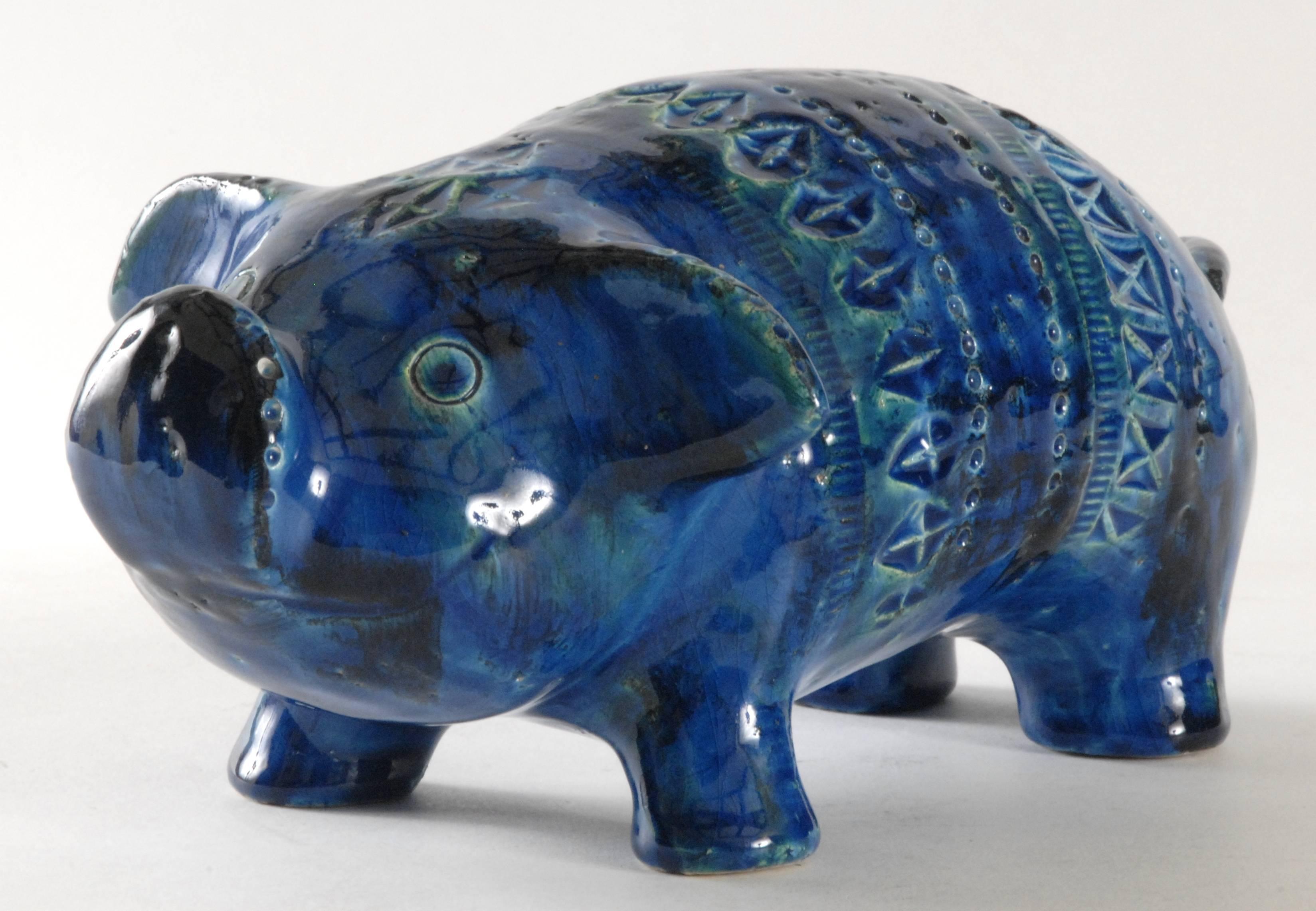 An Aldo Londi designed pig in 'Rimini Blu' pattern. Large size and whimsical expression with outstretched ears. Retains its paper 'Made in Italy' label.