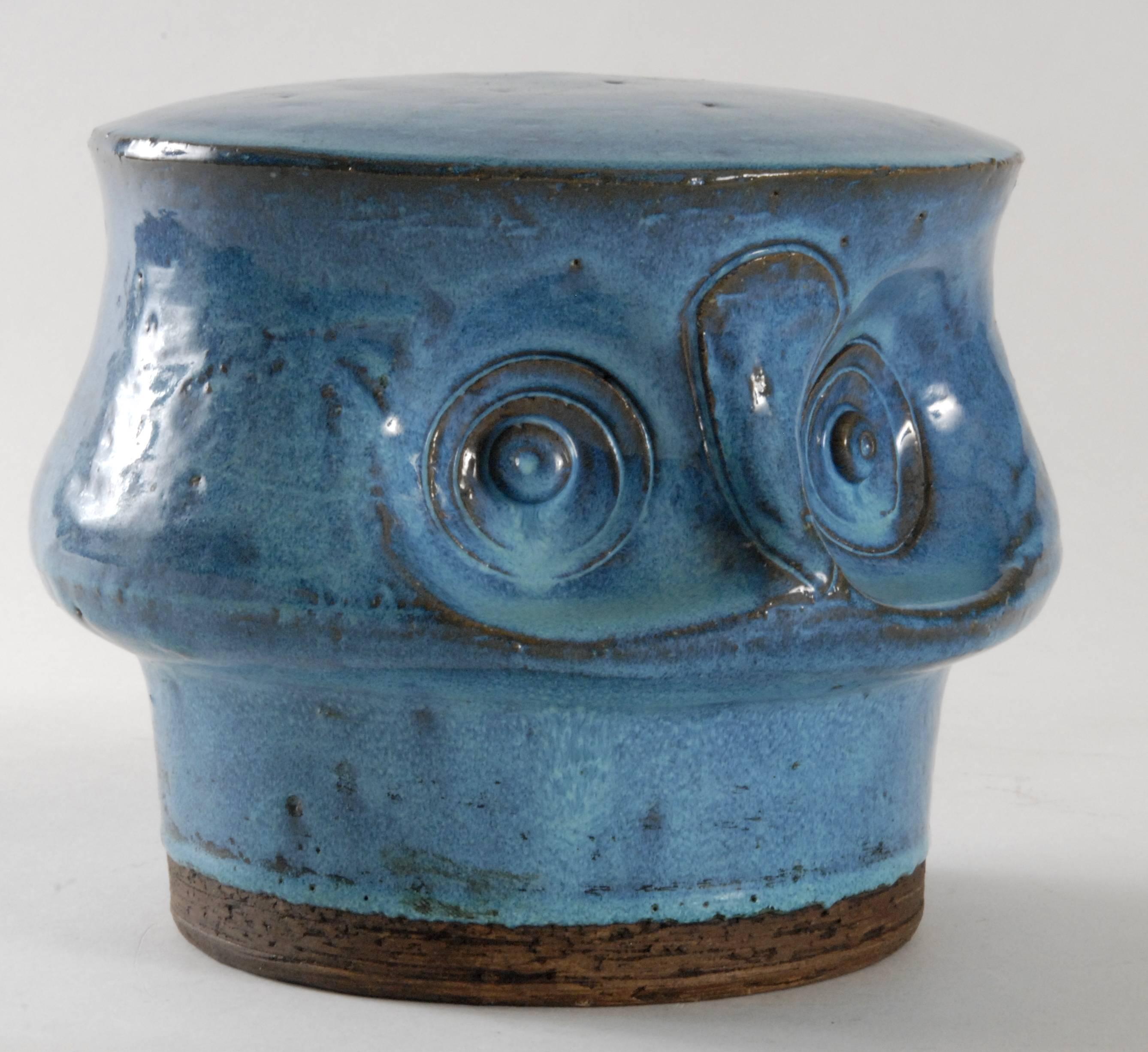 An Aldo Londi designed owl in sky blue with exposed clay body to the base. Dome shaped top. Has its paper 'Made in Italy' label to the base.