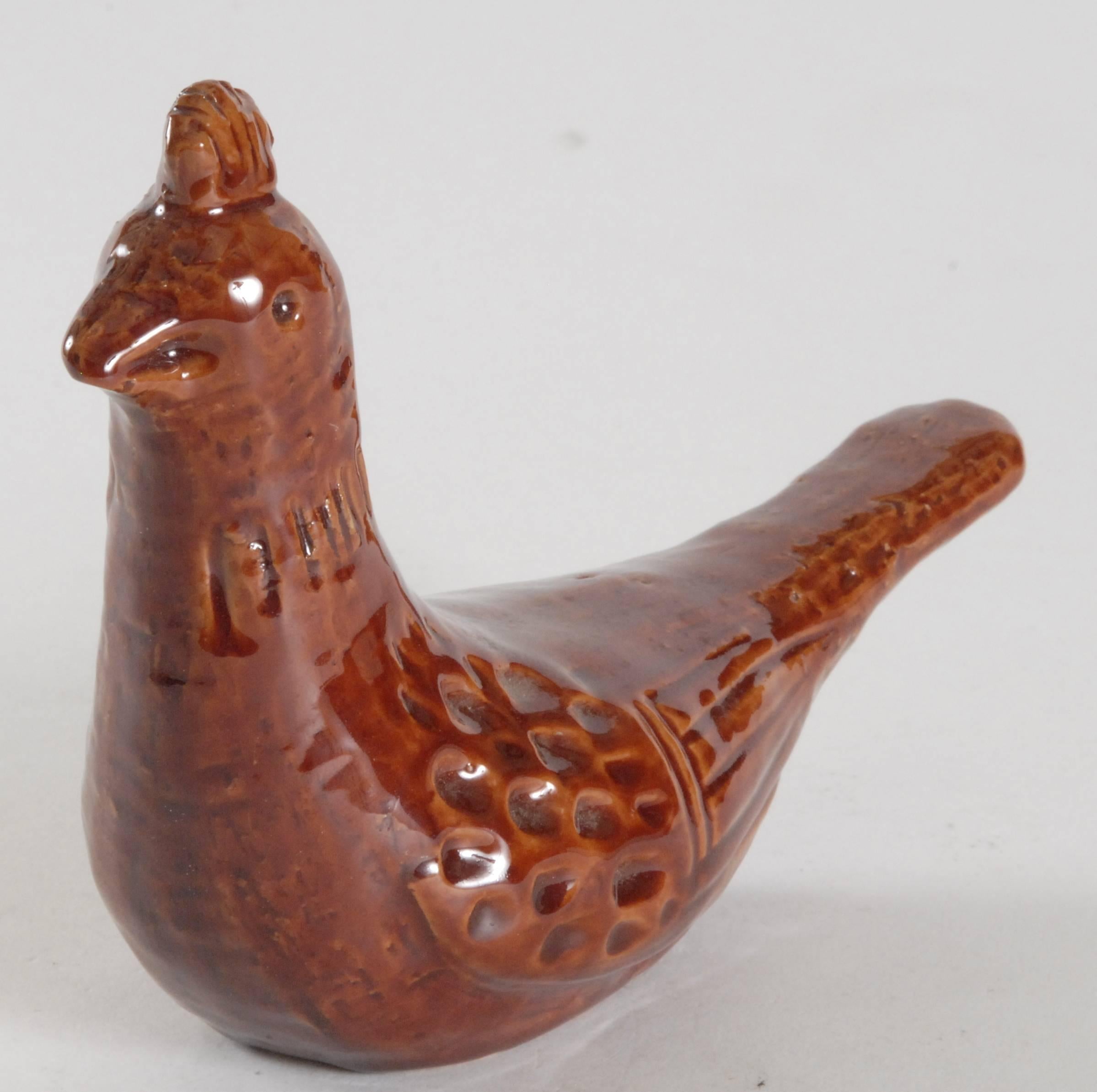 A Londi designed top-knot dove with the more unusual 'Terra Rossa' glaze. 
