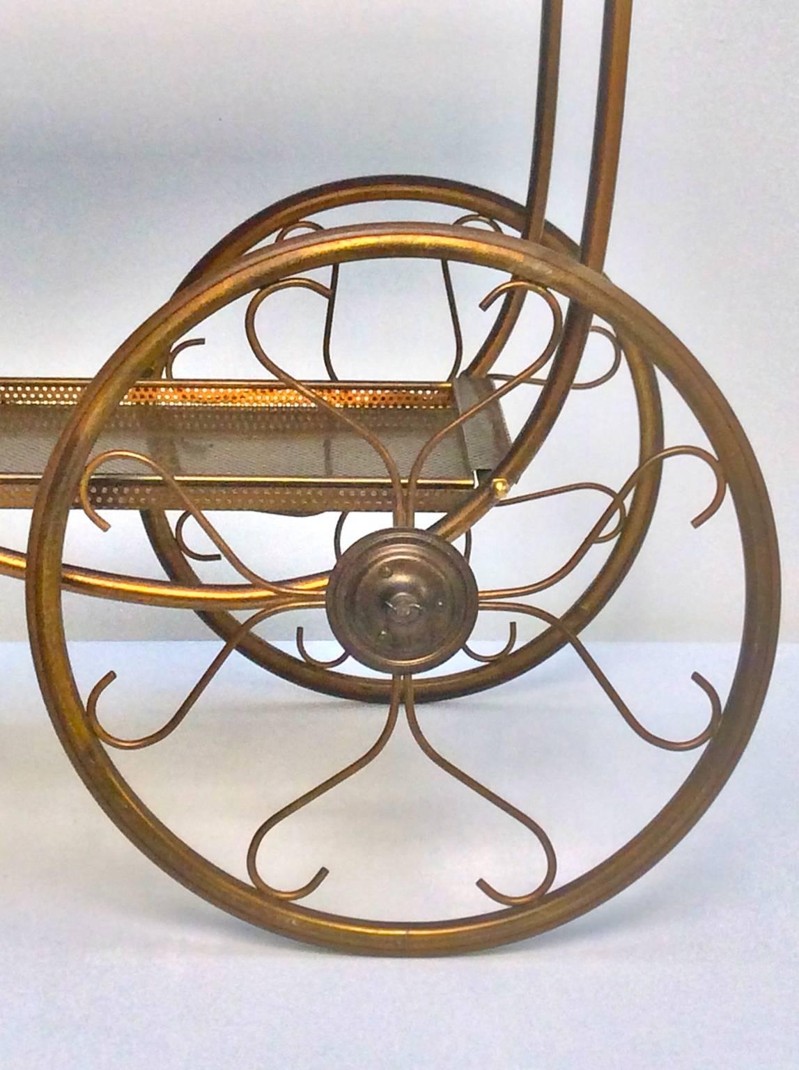Brass tea or bar cart or trolley by Svenskt Tenn, Sweden, 1950s.

***

From 27 September until 2 October you can see this piece at the Decorative Antiques & Textiles Fair in London

***

A delicate, decorative piece with a tubular brass