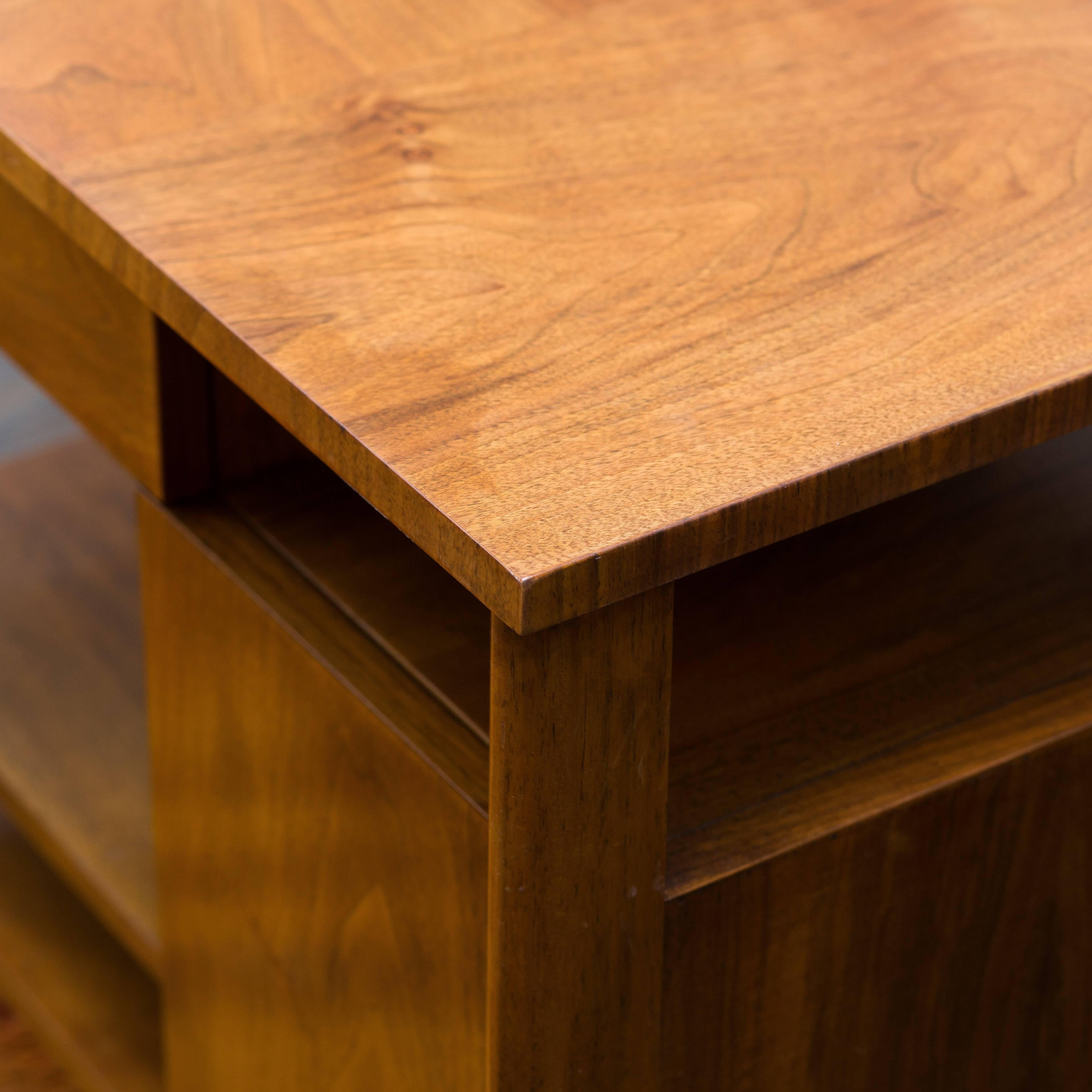 Clean mahagony nightstand by Widdicomb, featuring one-drawer, one shelf and a door.