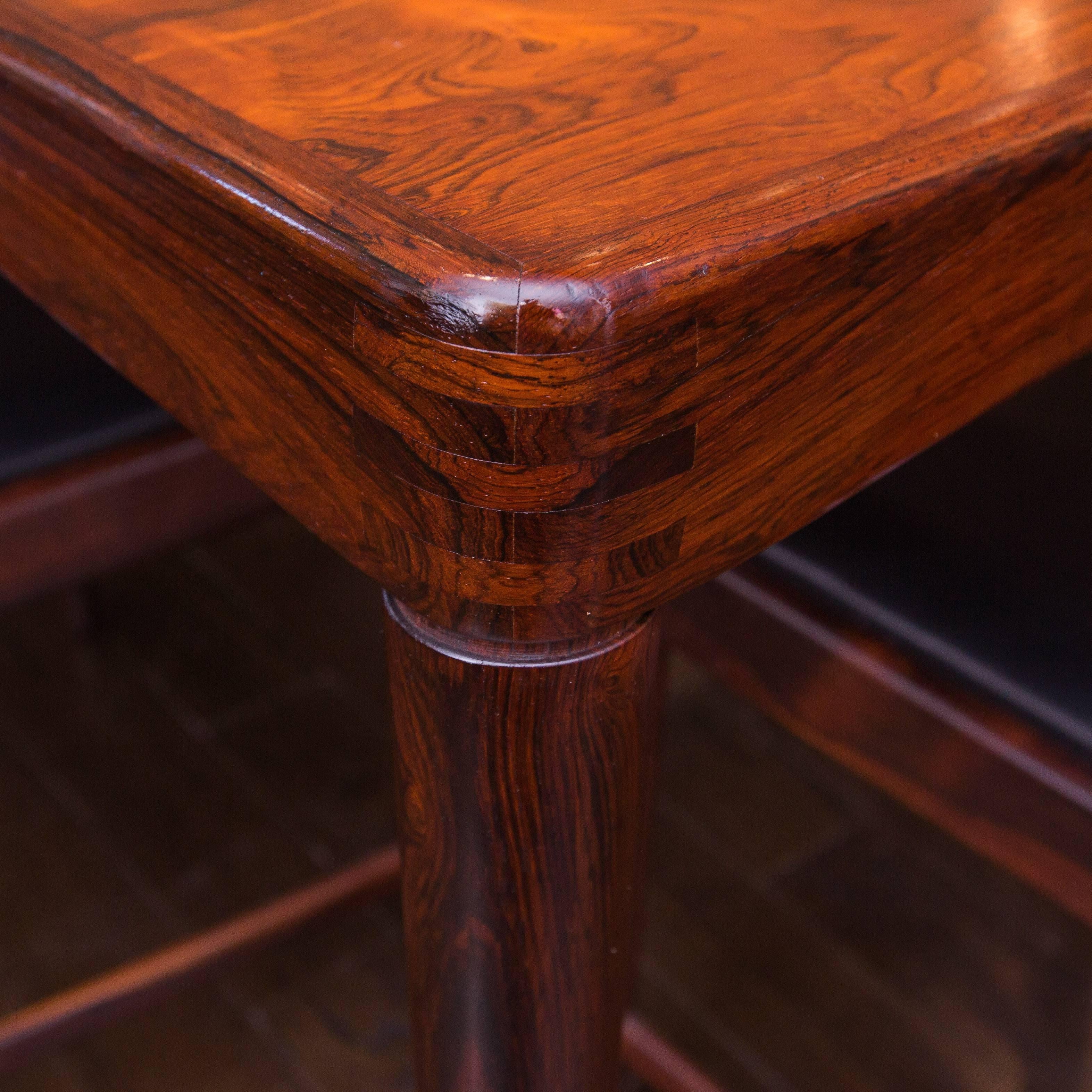 Fresh out of the original owner's estate where it has always been covered when not in use is this beautiful rosewood table with one 23.75