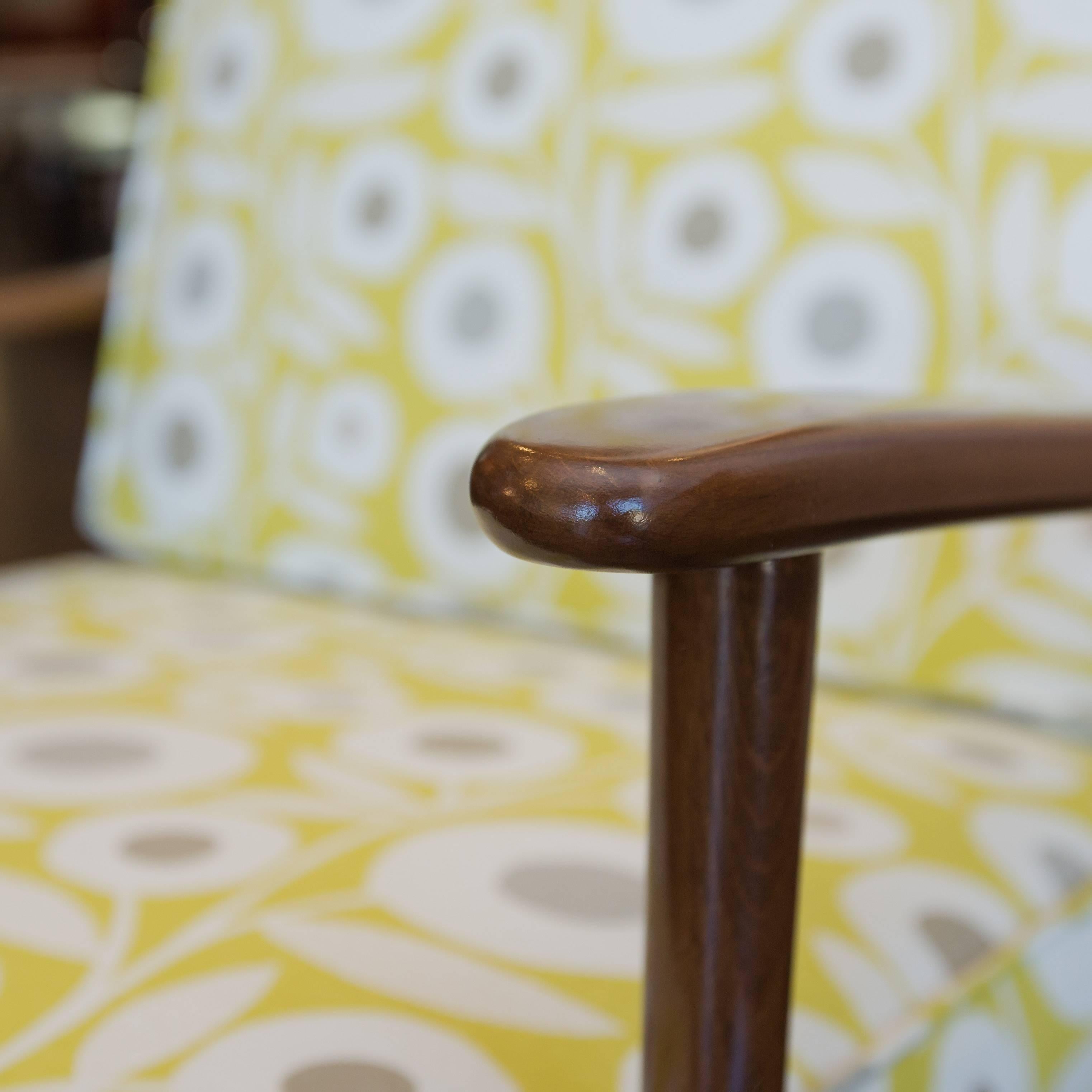 These Classic lounge chairs are newly refinished and reupholstered, including new foam.