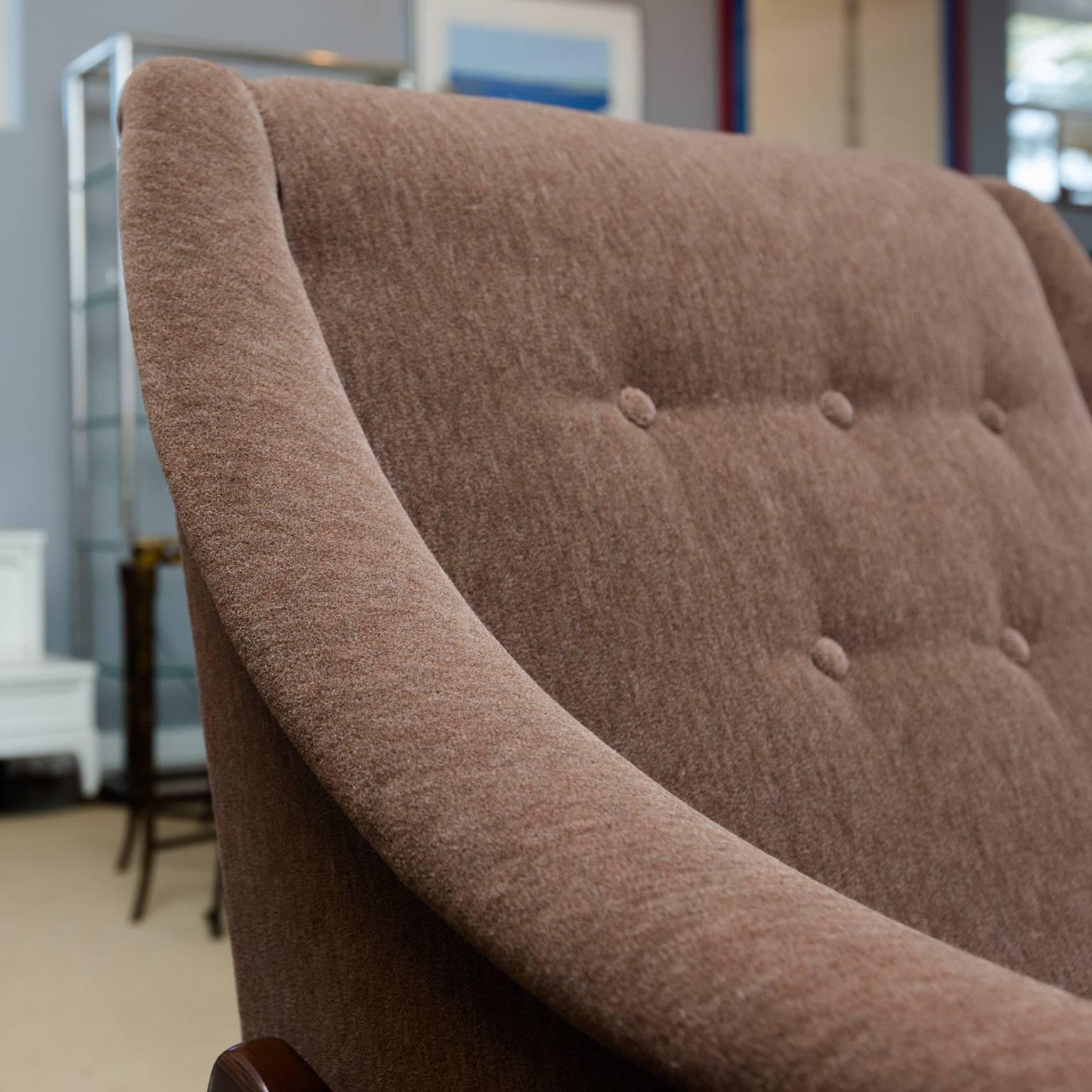 Newly recovered in a brown mohair-like fabric, this rocker or lounge is perfect for new moms and dads to rock the middle of the night away. Perfect for guests of any age. Frame and fabric in mint condition.