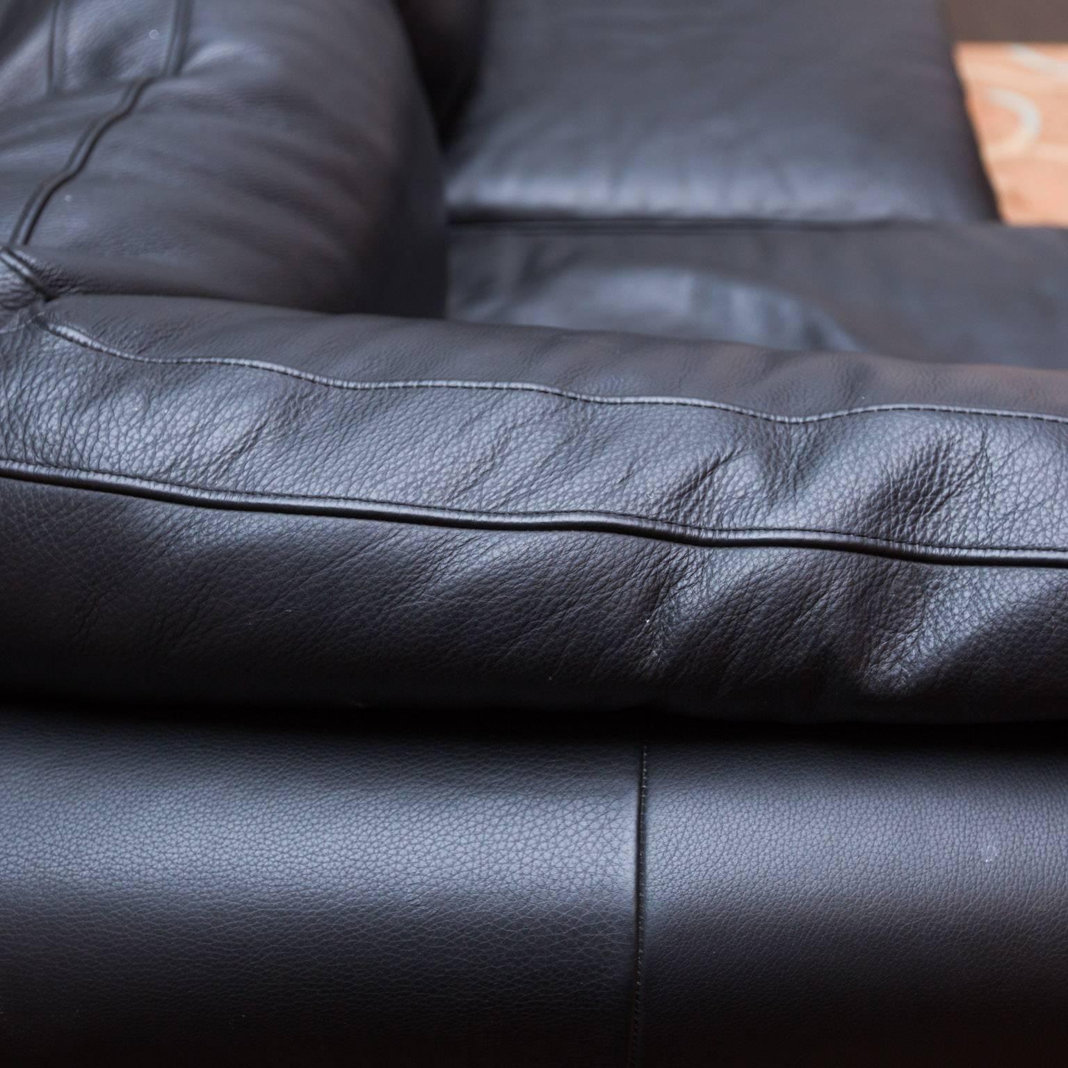 Super clean Italian leather sectional no longer available from Design Within Reach. Pillows are zippered in to prevent shifting, so they alwaya retain their shape.