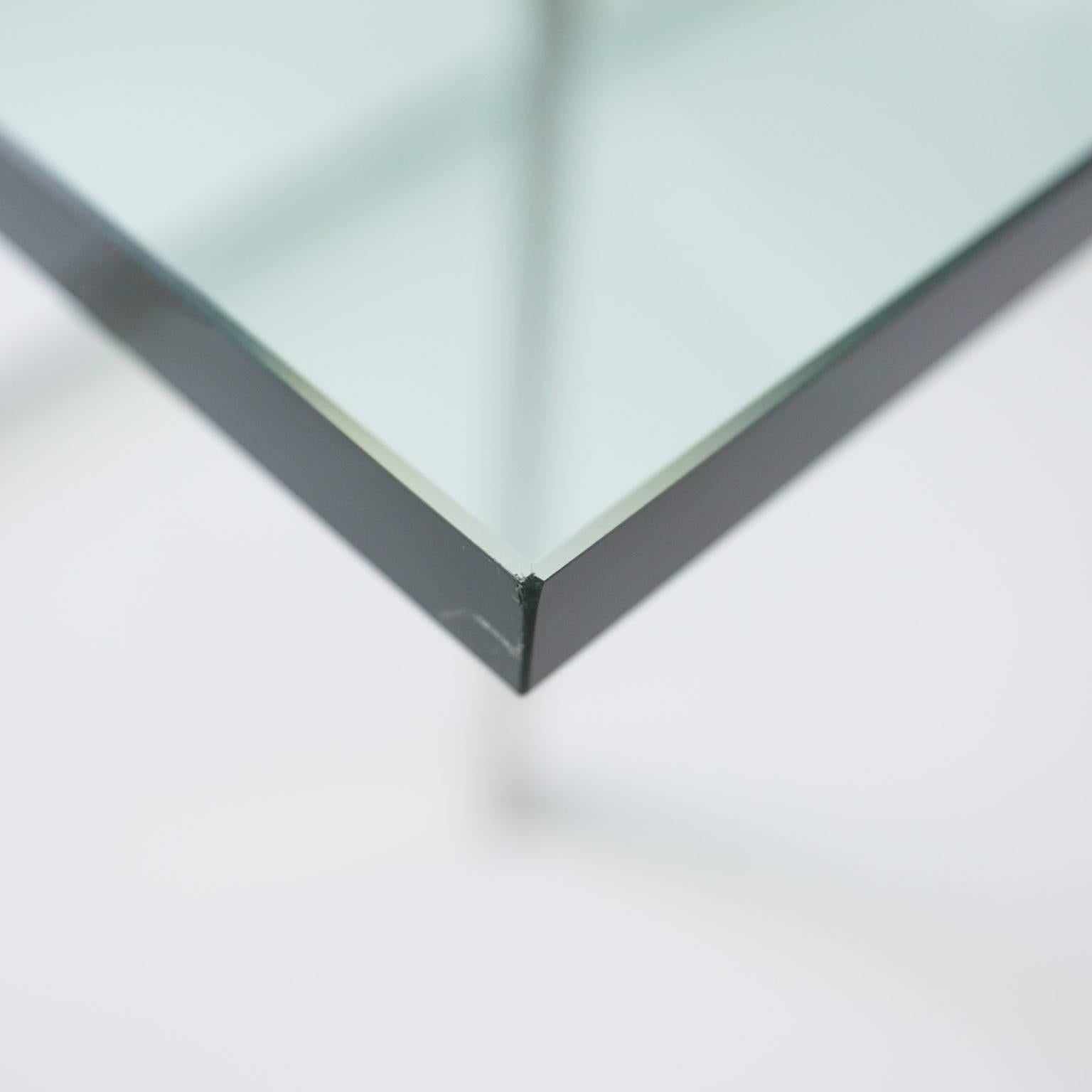 Iconic X-base table by Knoll. Table base is being sold without glass allowing you to start fresh with a new piece. The original glass is available with a few scratches for local pickup only.
