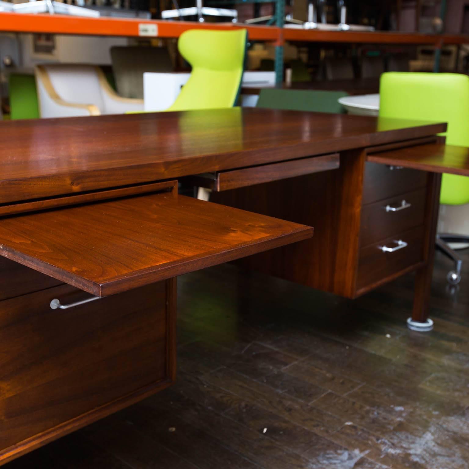 This rare walnut desk by Risom has just been professionally refinished.