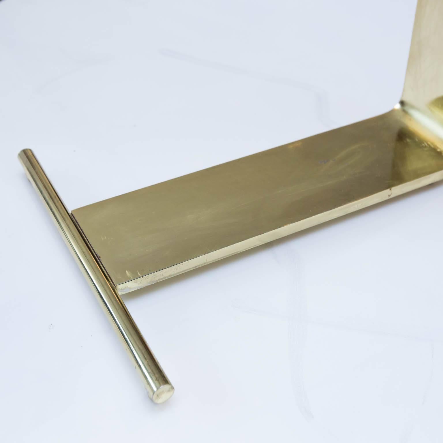 DIA brass and glass cantilevered table. Glass is 1/2