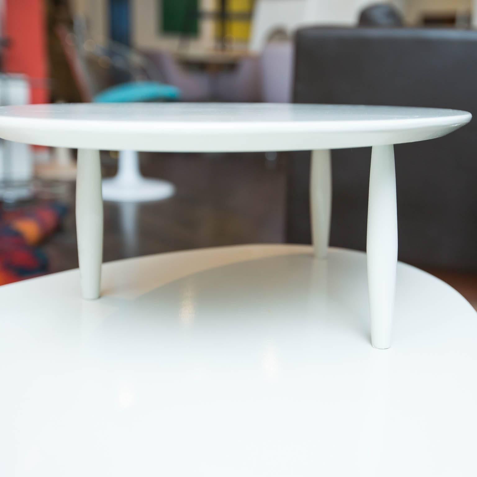 Lacquered in white dove with silver legs tips, this iconic MCM table set is a perfect addition to any hipster lounge area.