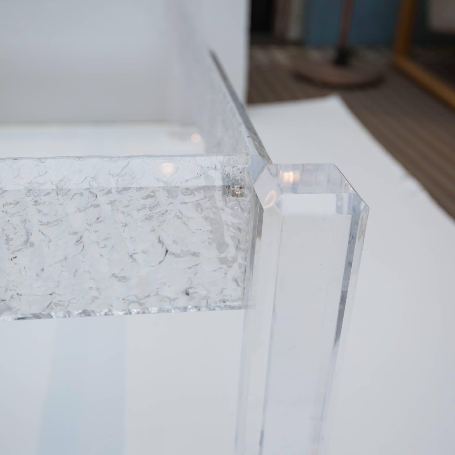 If you love Lucite and want something other than mass-produced, clean-edged designs, this is the rare piece you've been looking for. Made from solid Lucite, this is being sold without the 1/2