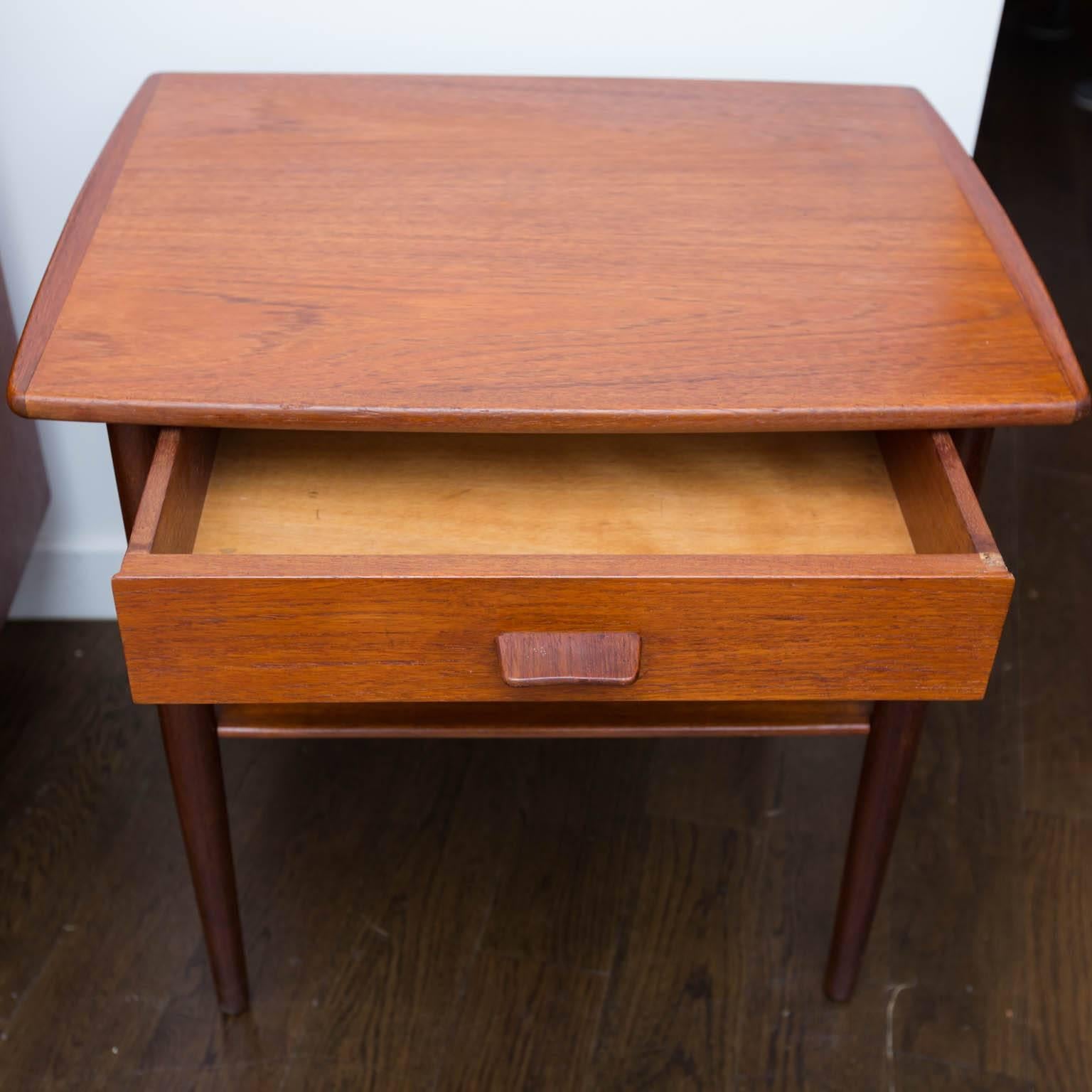 Clean teak side table or nightstand with angled teak drawer pull identical to those featured on Volther's pieces.
