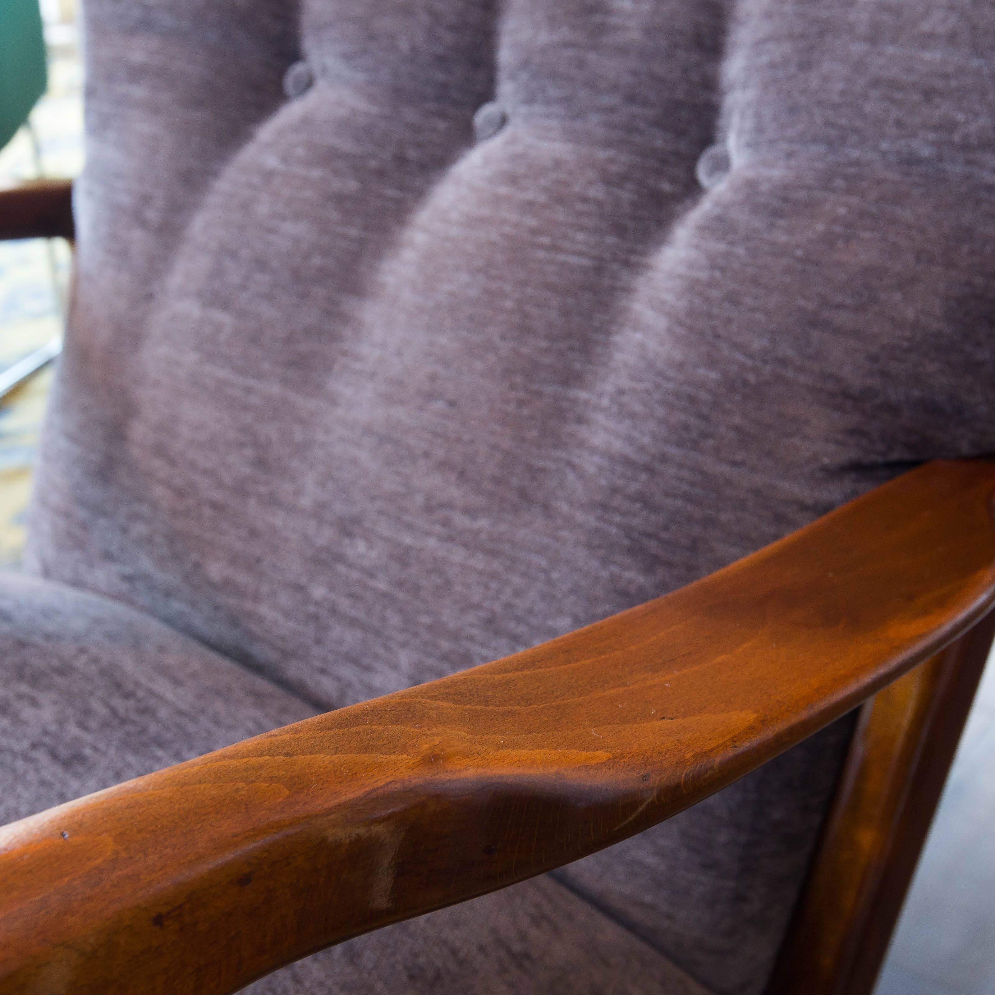 Beautiful early Fritz Hansen armchair from the 40s in stained beechwood. Newly reupholsterded in charcoal chenille.