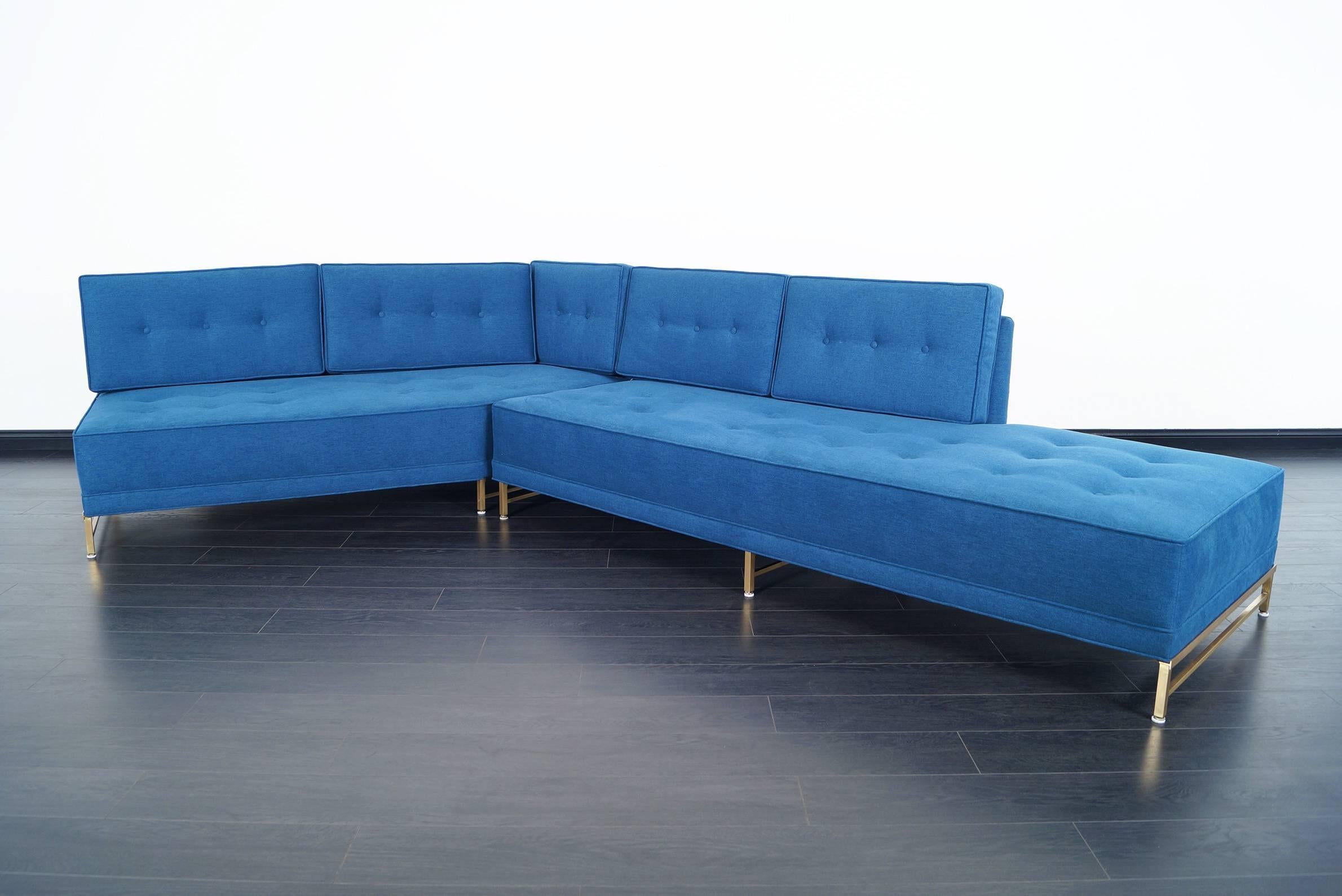 Amazing vintage two piece sectional sofa designed by Paul McCobb for Directional, circa 1950s. This wonderful sofa has a particular and modern design, joining at an angle appropriate to the dimensions of the sofa gives us an exceptional panoramic