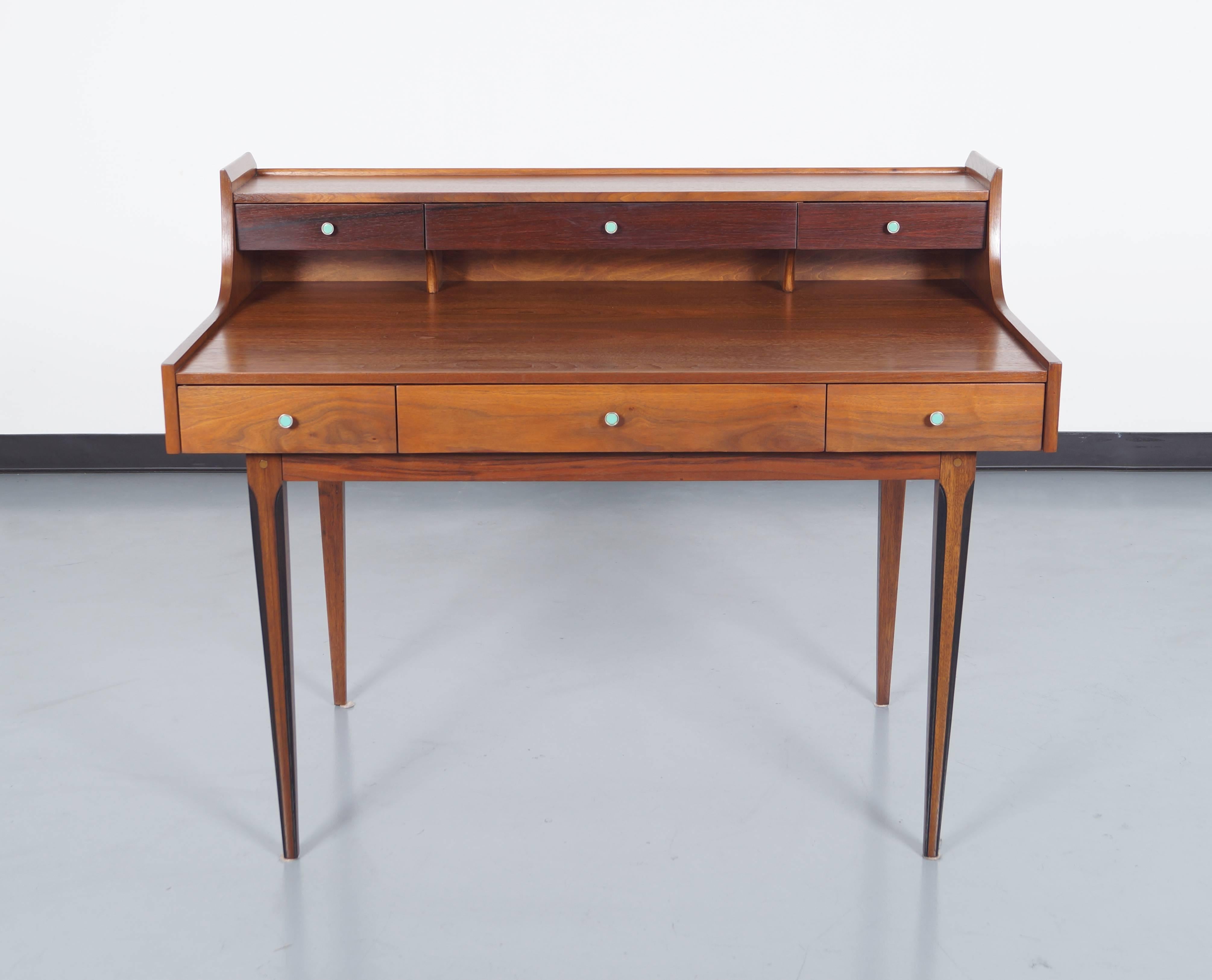 Vintage walnut and rosewood desk by Kroehler.