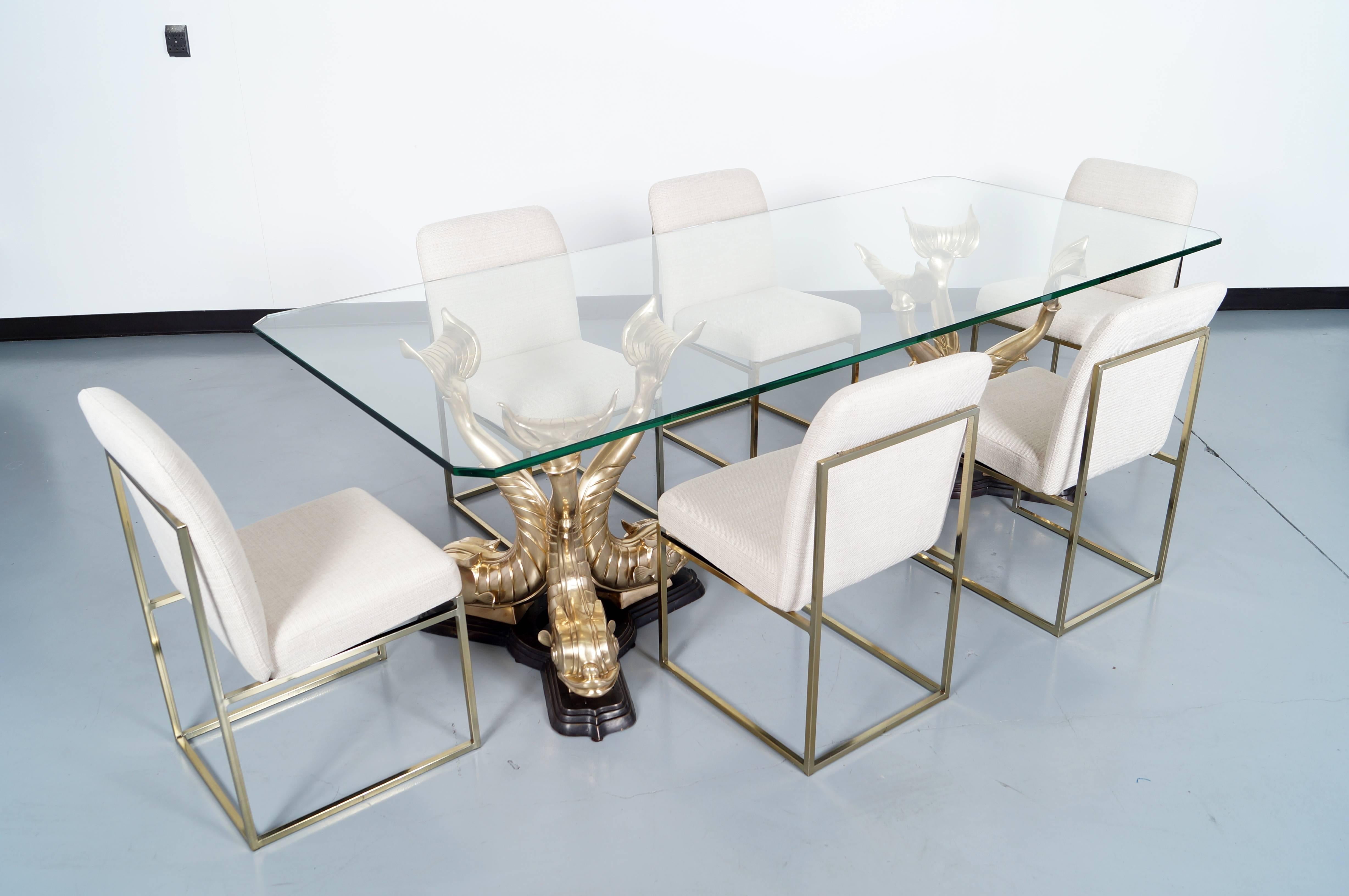 Exceptional vintage Italian koi fish dining table or conference table manufactured in Italy, circa 1970s. This beautiful table features two extremely sturdy bronze bases that are sculpted in a beautiful koi Fish Design, the detailing on the