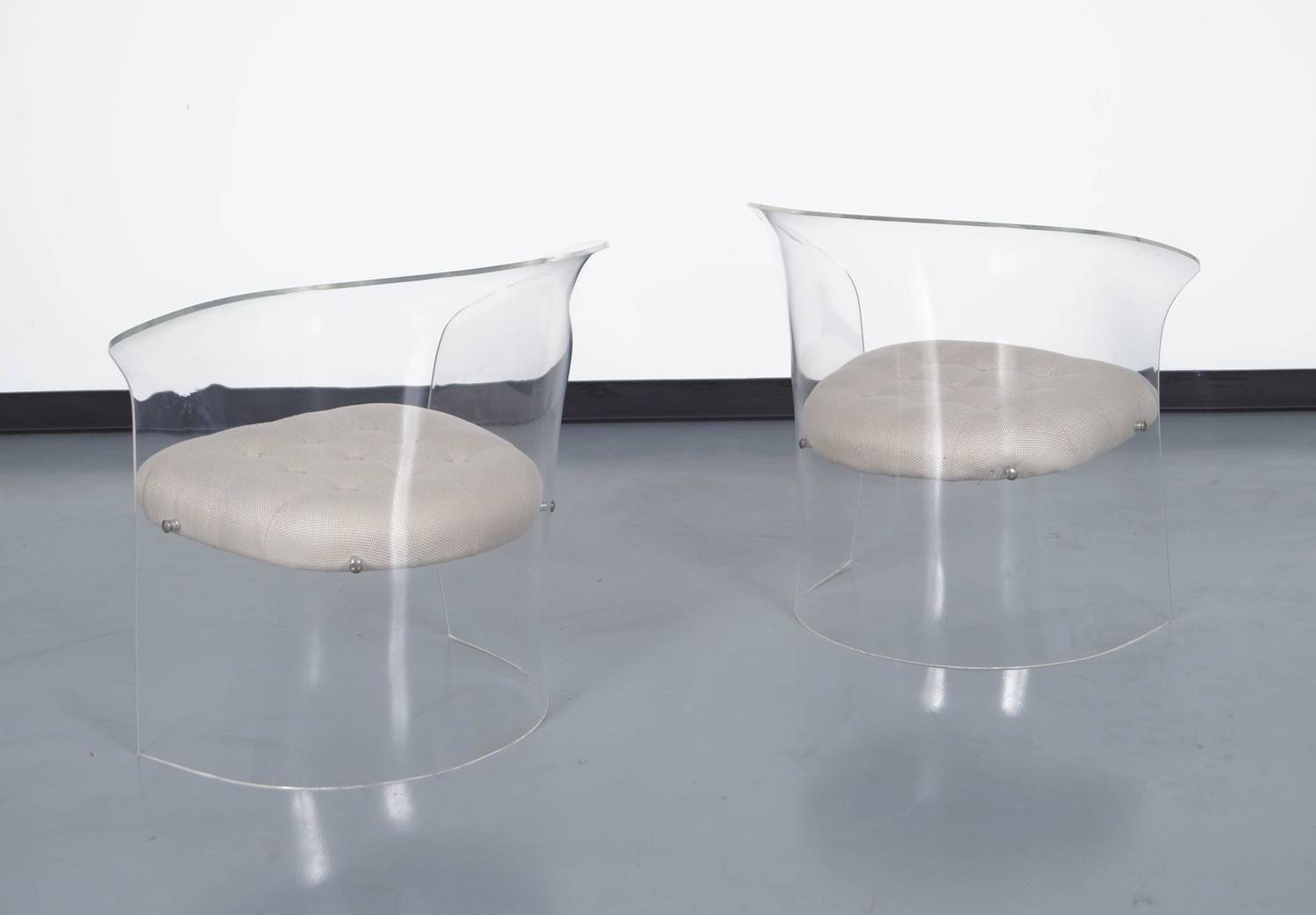 vintage flexuous lucite chairs