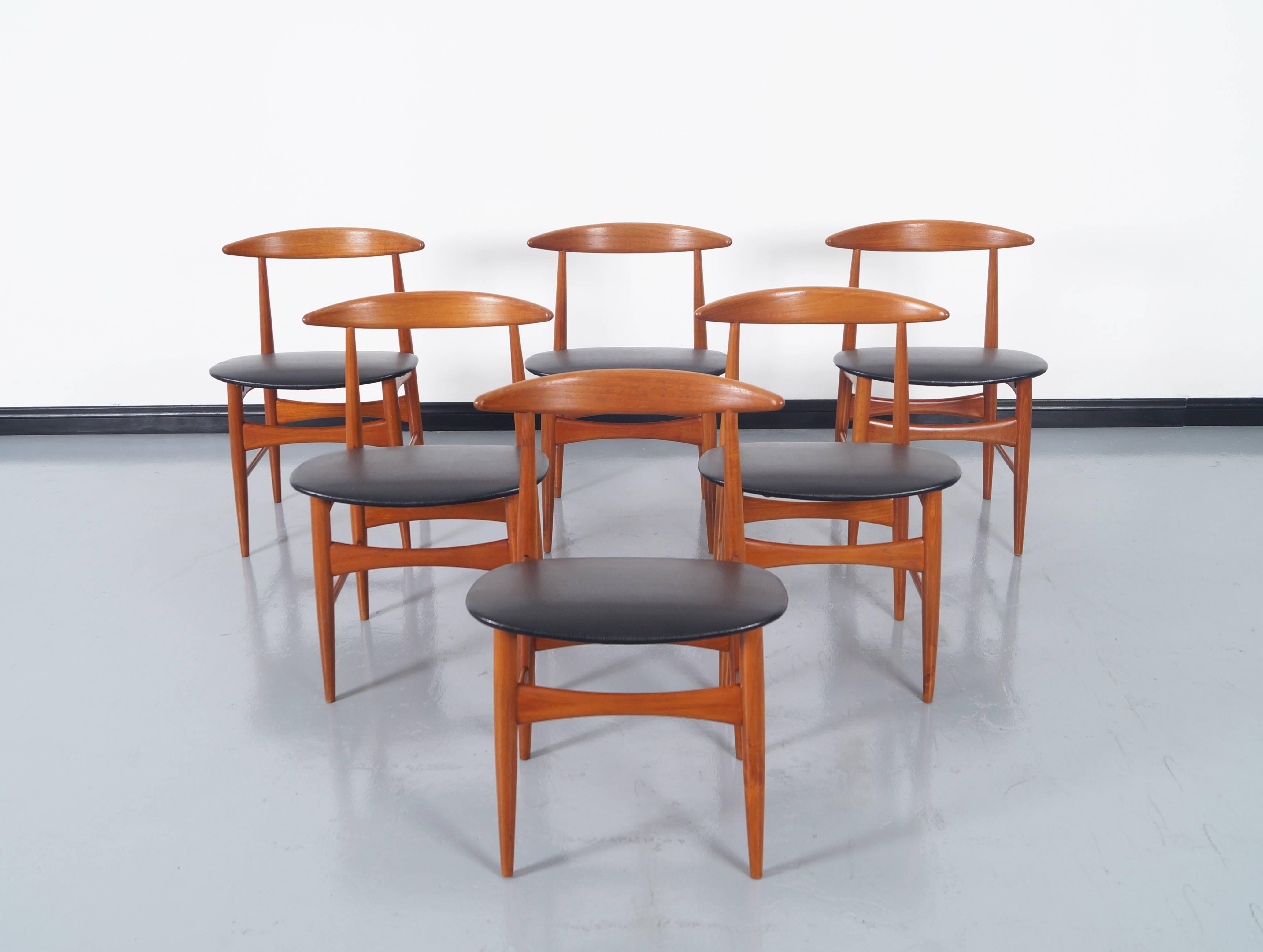 Faux Leather Danish Modern Teak Dining Chairs by Mogens Kold