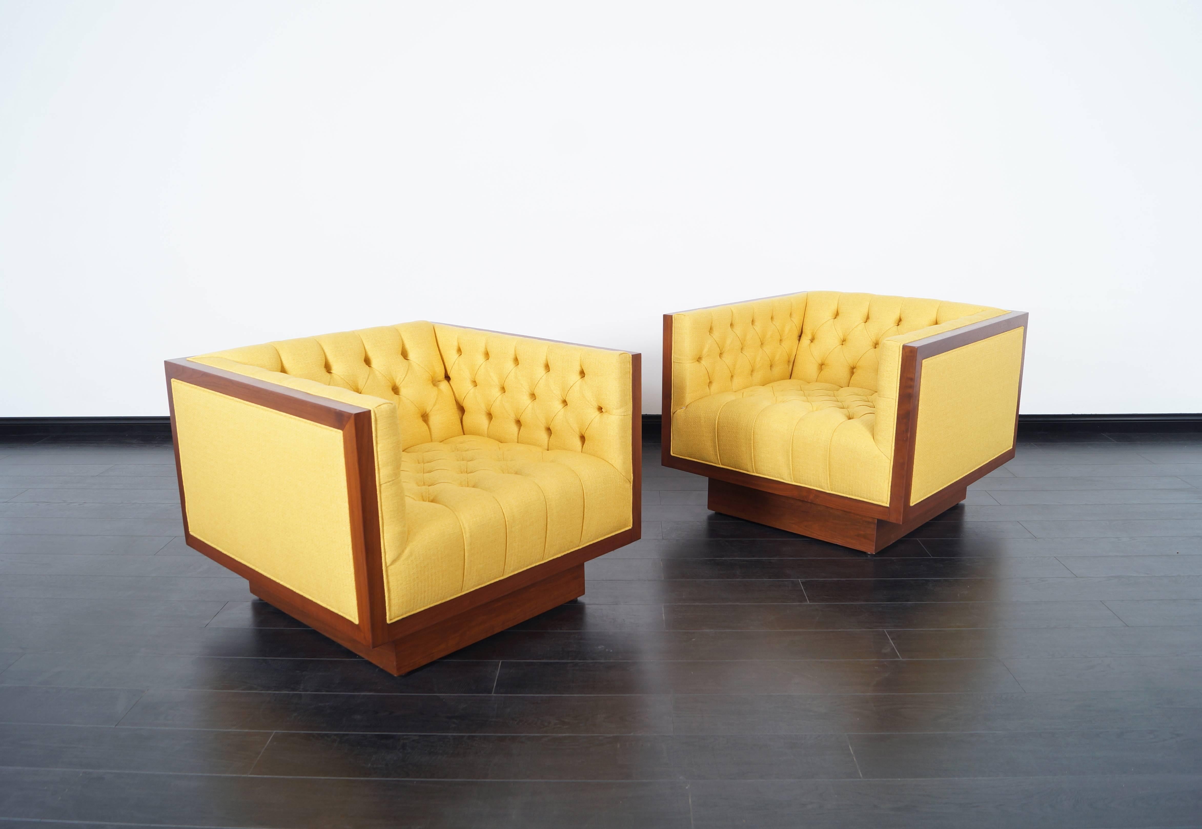 Fabulous oversized walnut lounge chairs attributed to Milo Baughman. These spectacular chairs are simply amazing!