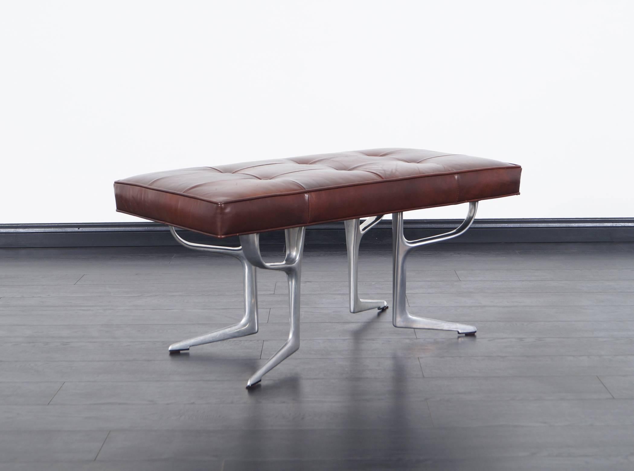 Stunning sculptural aluminum and leather bench in the style of Vladimir Kagan.