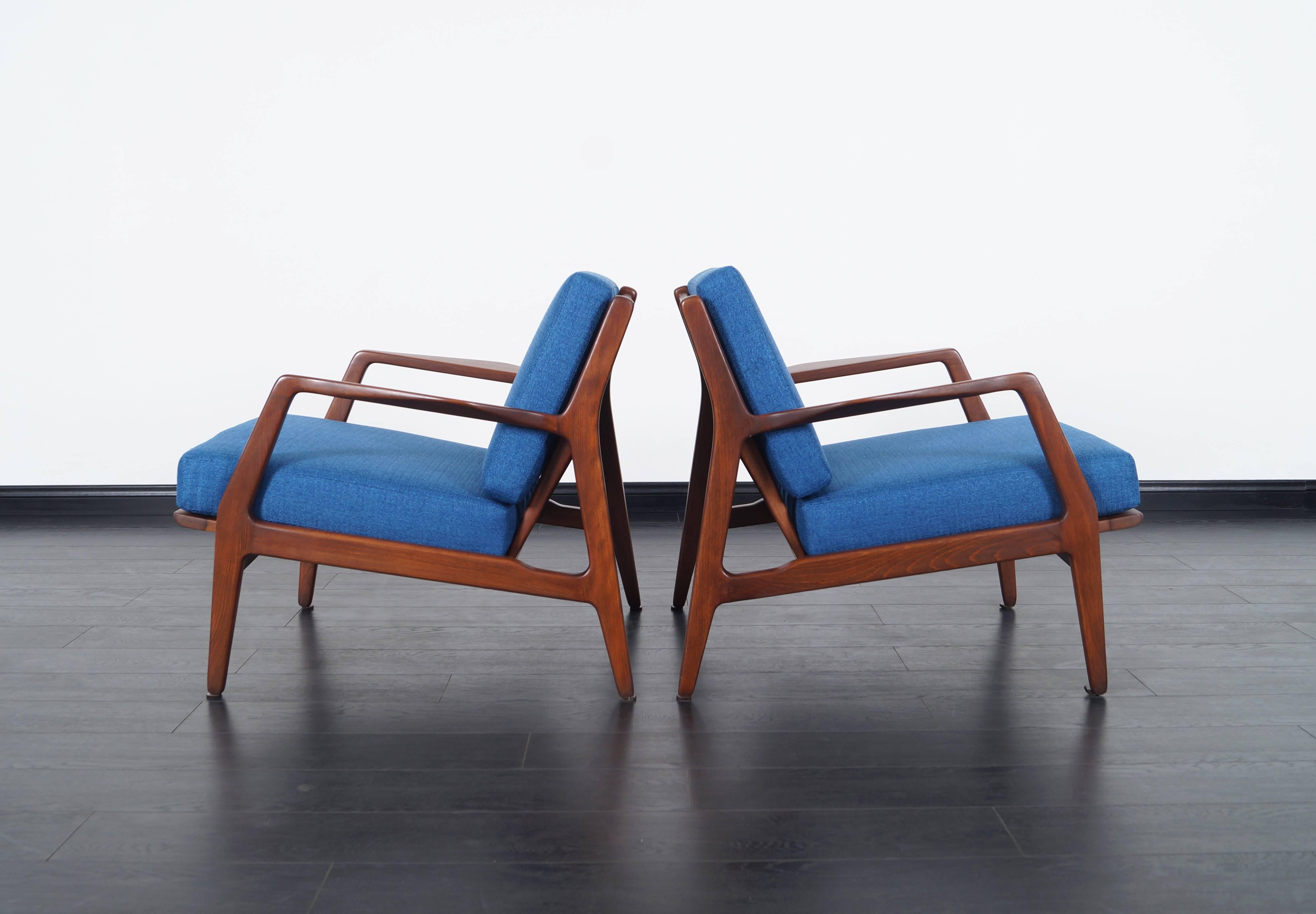 Pair of fabulous Mid-Century Modern lounge chairs designed by Ib Kofod-Larsen.