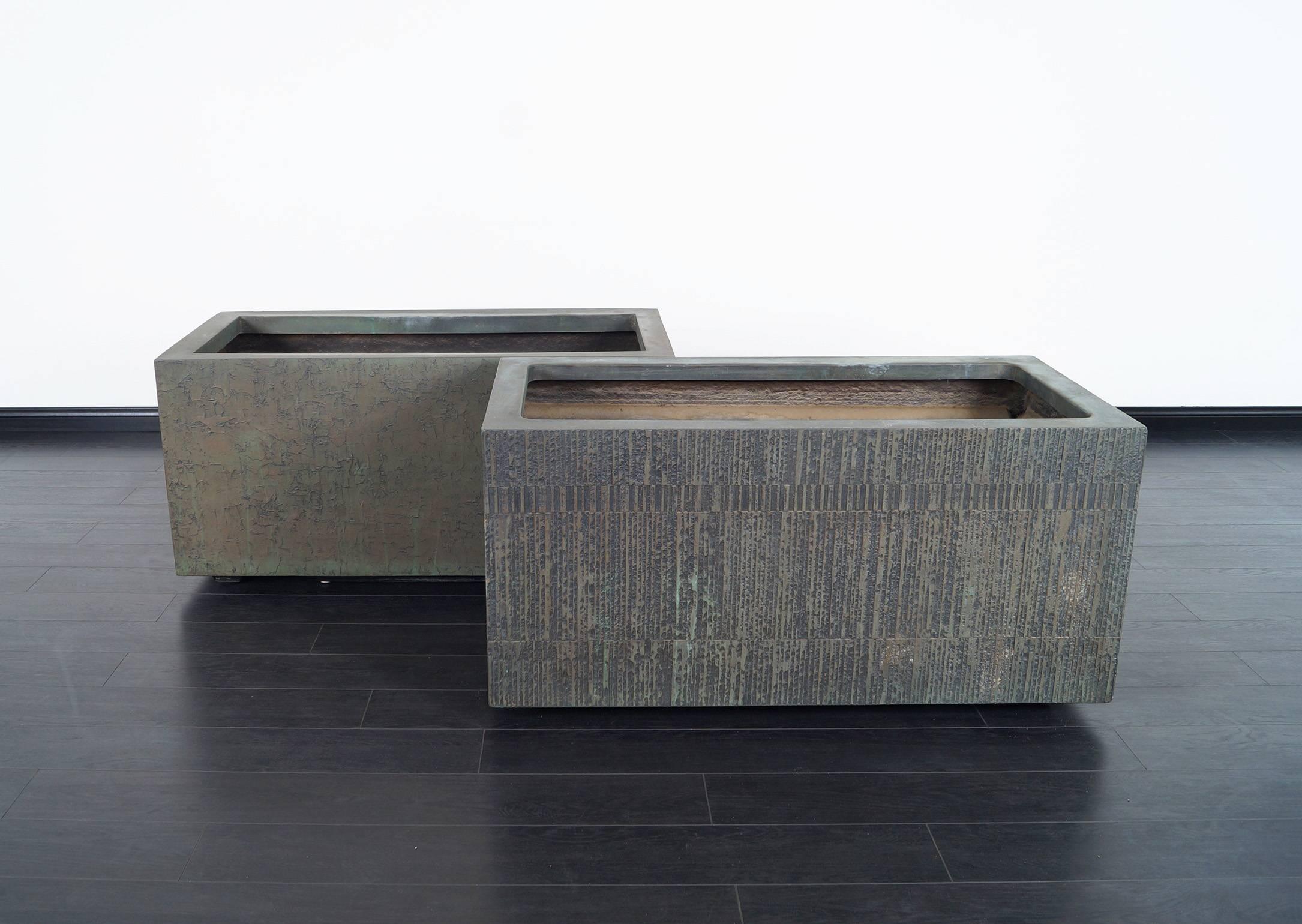 Pair of massive architectural cast bronze resin planters by Forms and Surfaces.