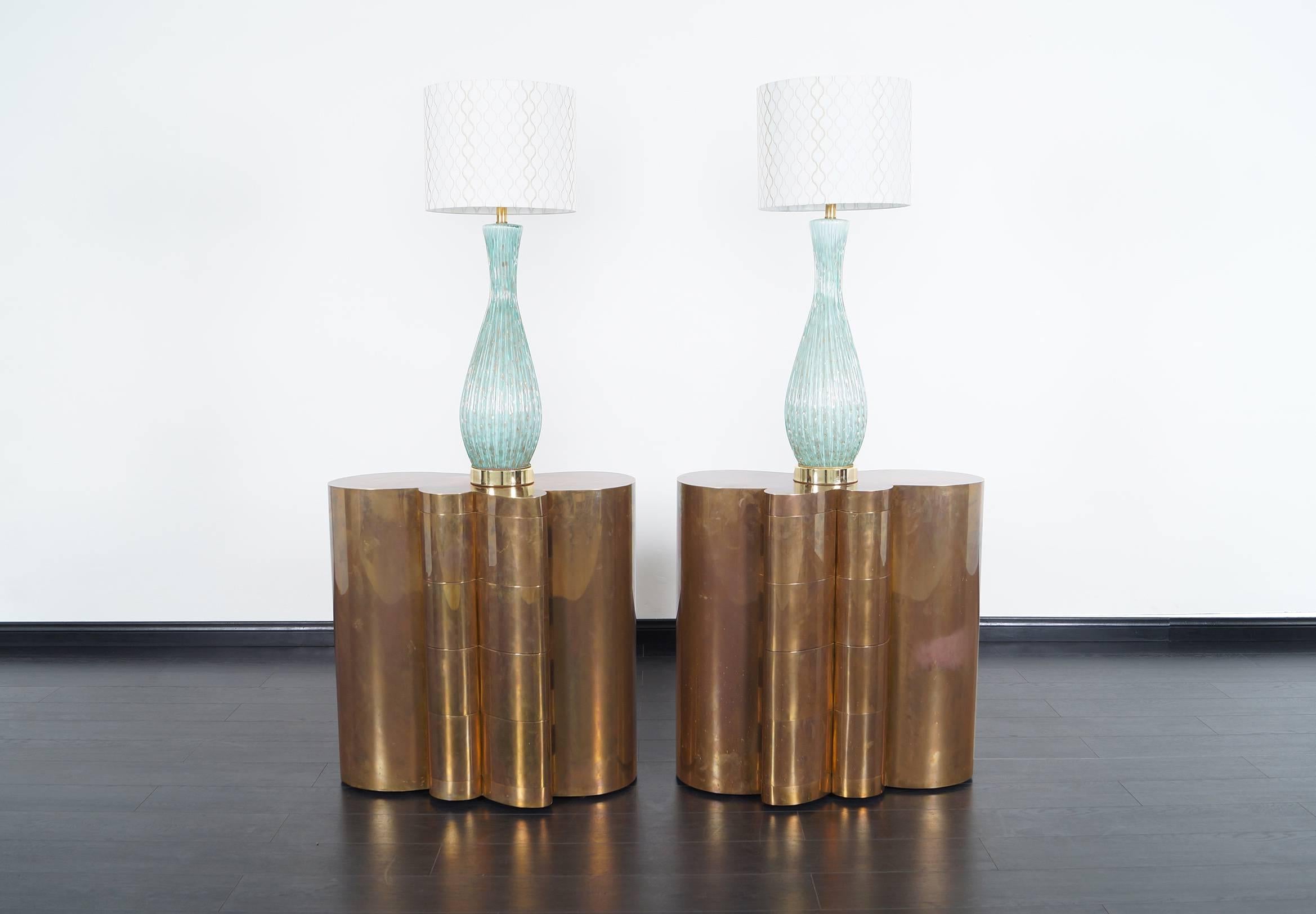 Pair of beautiful Murano glass lamps. Features controlled bubbles and gold leaf inclusion.