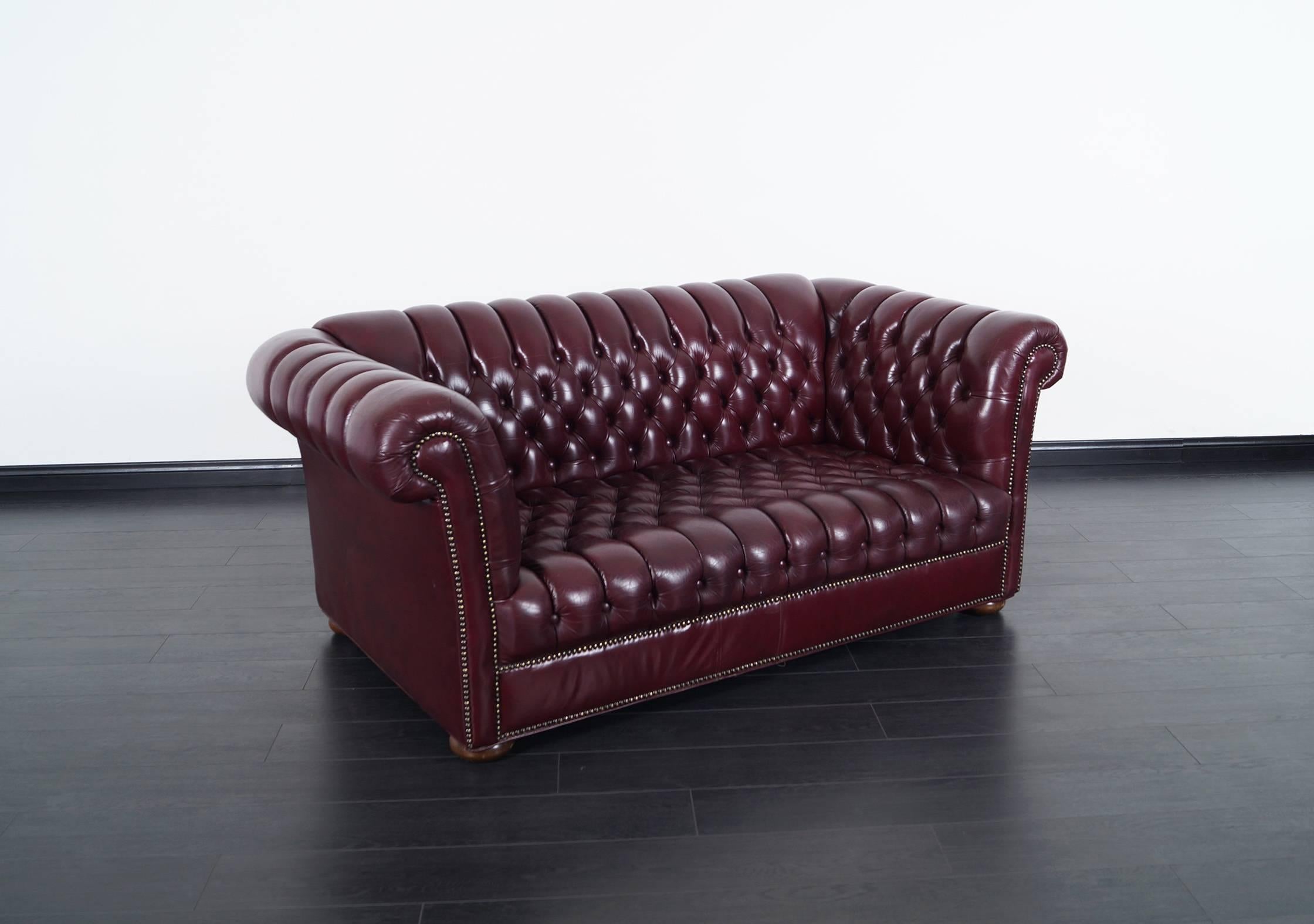 burgundy leather loveseat