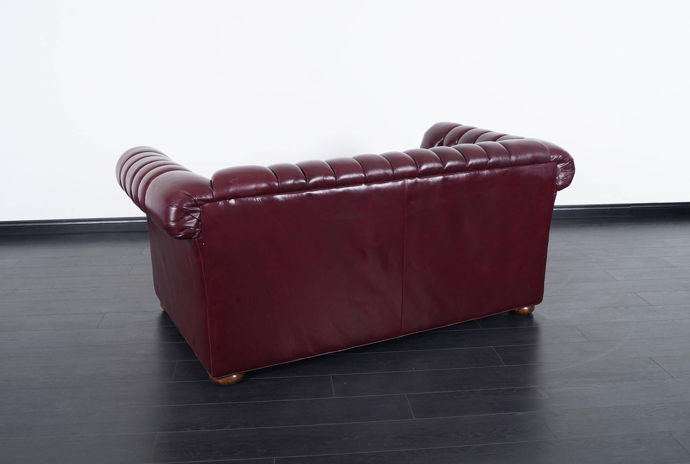 American Vintage Burgundy Leather Chesterfield Loveseat