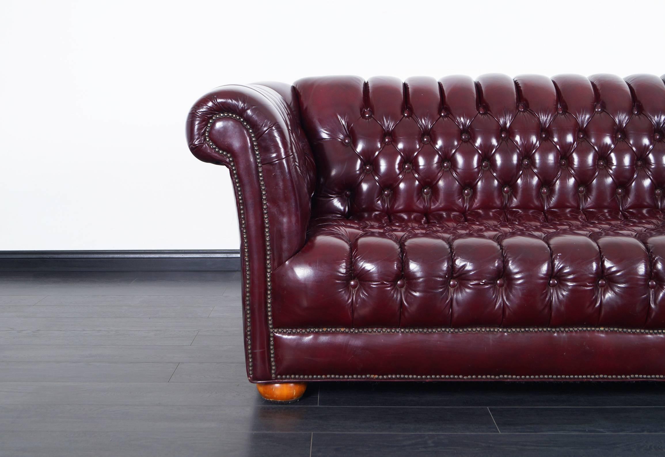 burgundy sofa leather