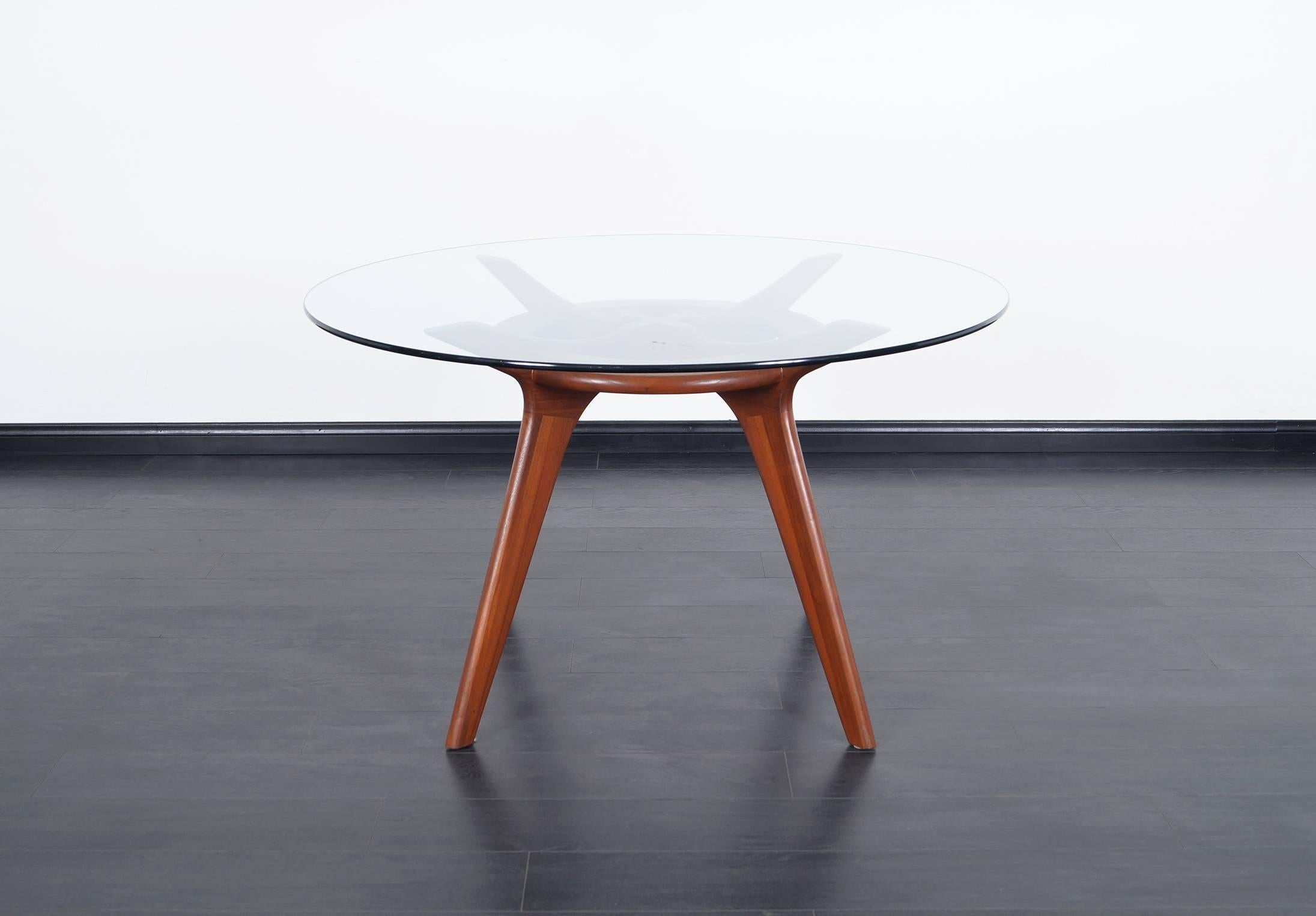 Sculptural walnut dining table designed by Adrian Pearsall for Craft Associates.