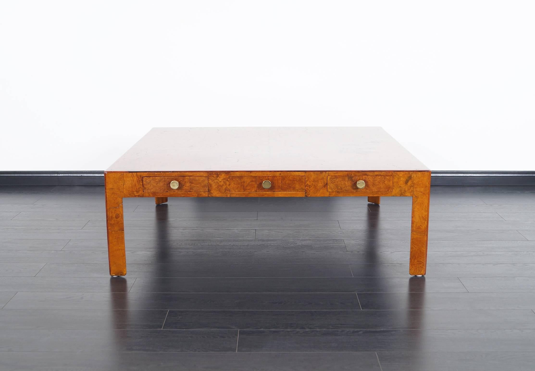 This gorgeous Italian coffee table features a total of six drawers with solid brass pulls. Made in Italy for Cannell & Chaffin, Los Angeles.