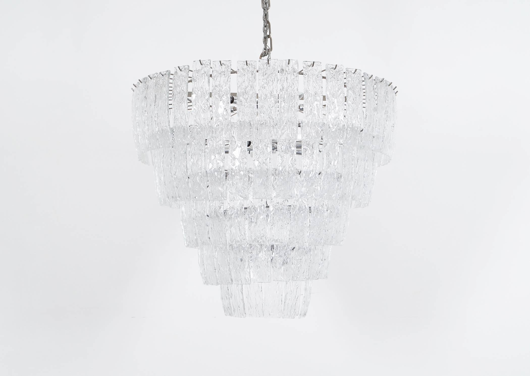 Large five-tiered Murano glass chandelier. Made in Italy. Each curved glass is handblown and measures 9.5