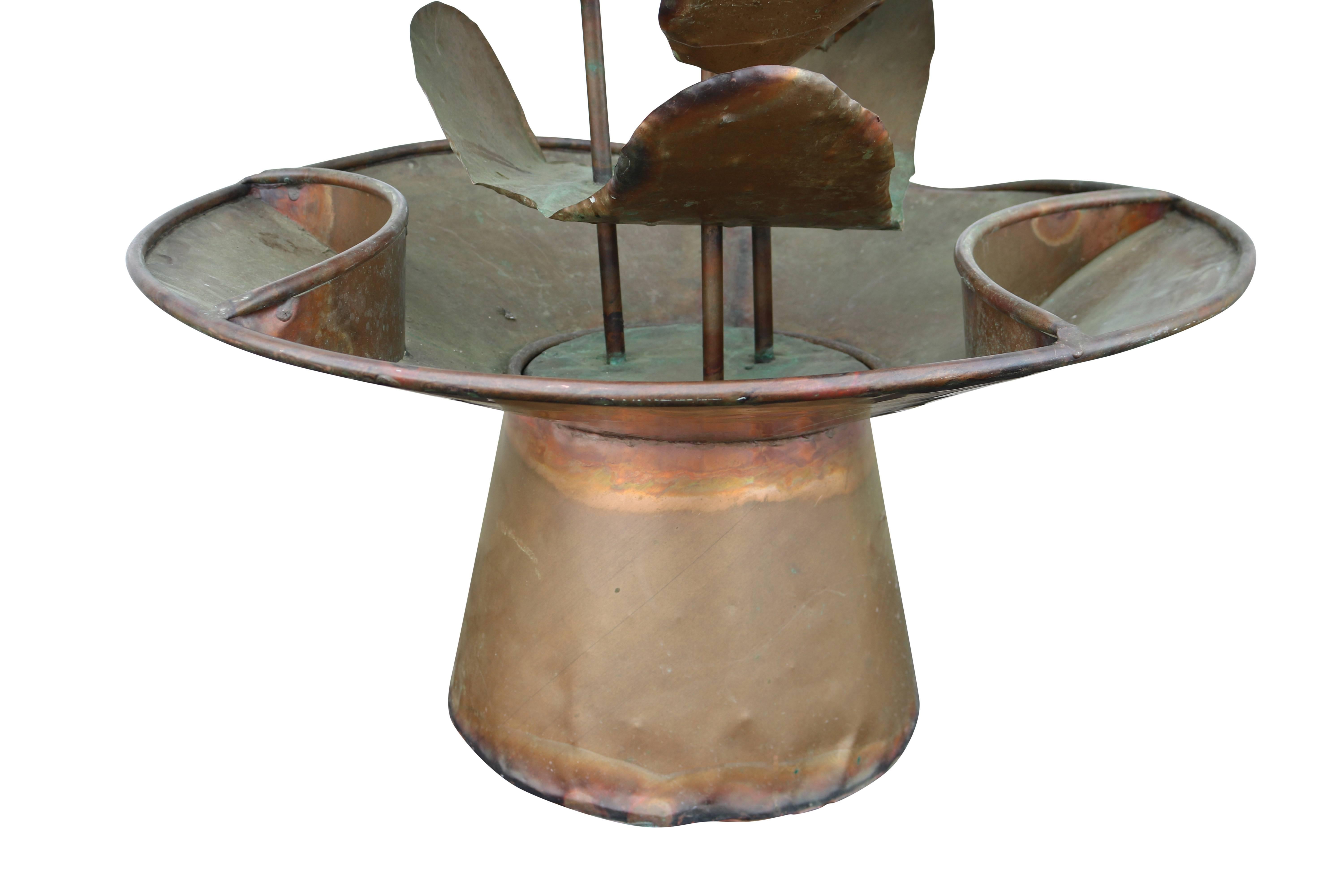 Lovely and loved, this vintage brass water fountain consists of three 