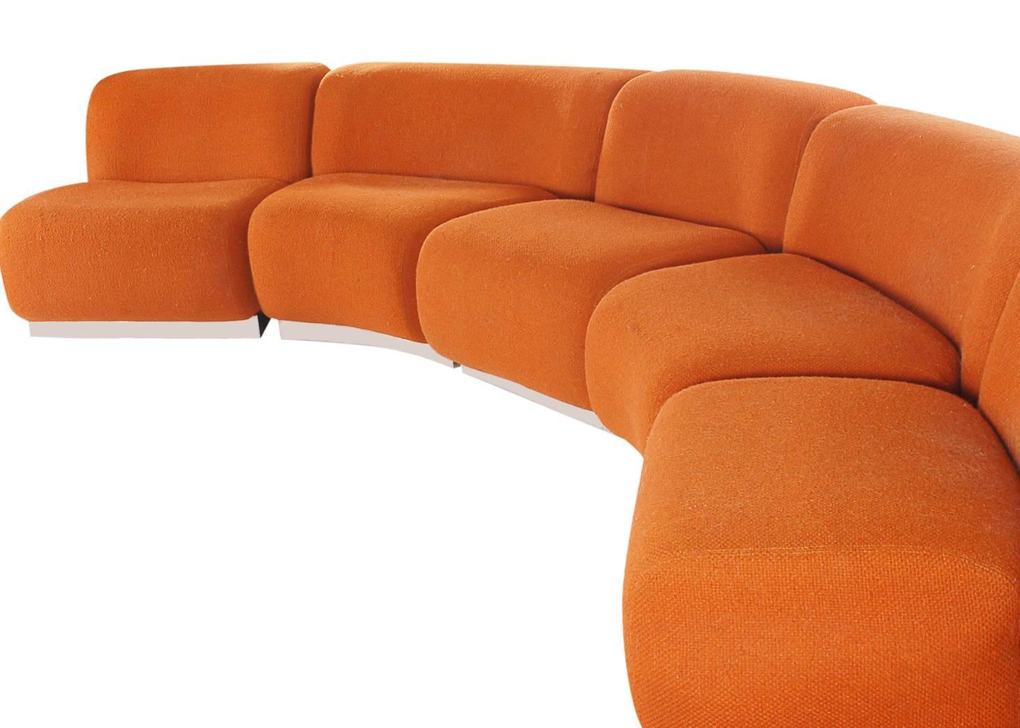 Vintage five piece modular sofa, circa 1970s. It features chrome plinth bases with original burnt orange tweed.

In the style of: Don Chadwick, Herman Miller and Milo Baughman.