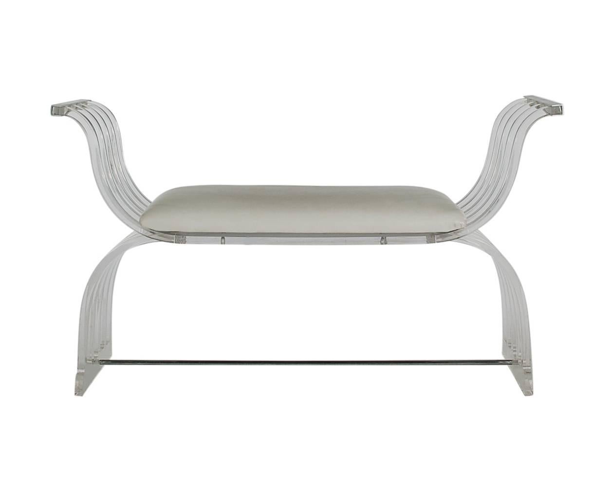 A funky sculptural bench constructed of thick curved Lucite. It features stainless steel arms with original white Naugahyde seat cushion.

In the style of: Charles Hollis Jones, Pace and Karl Springer.