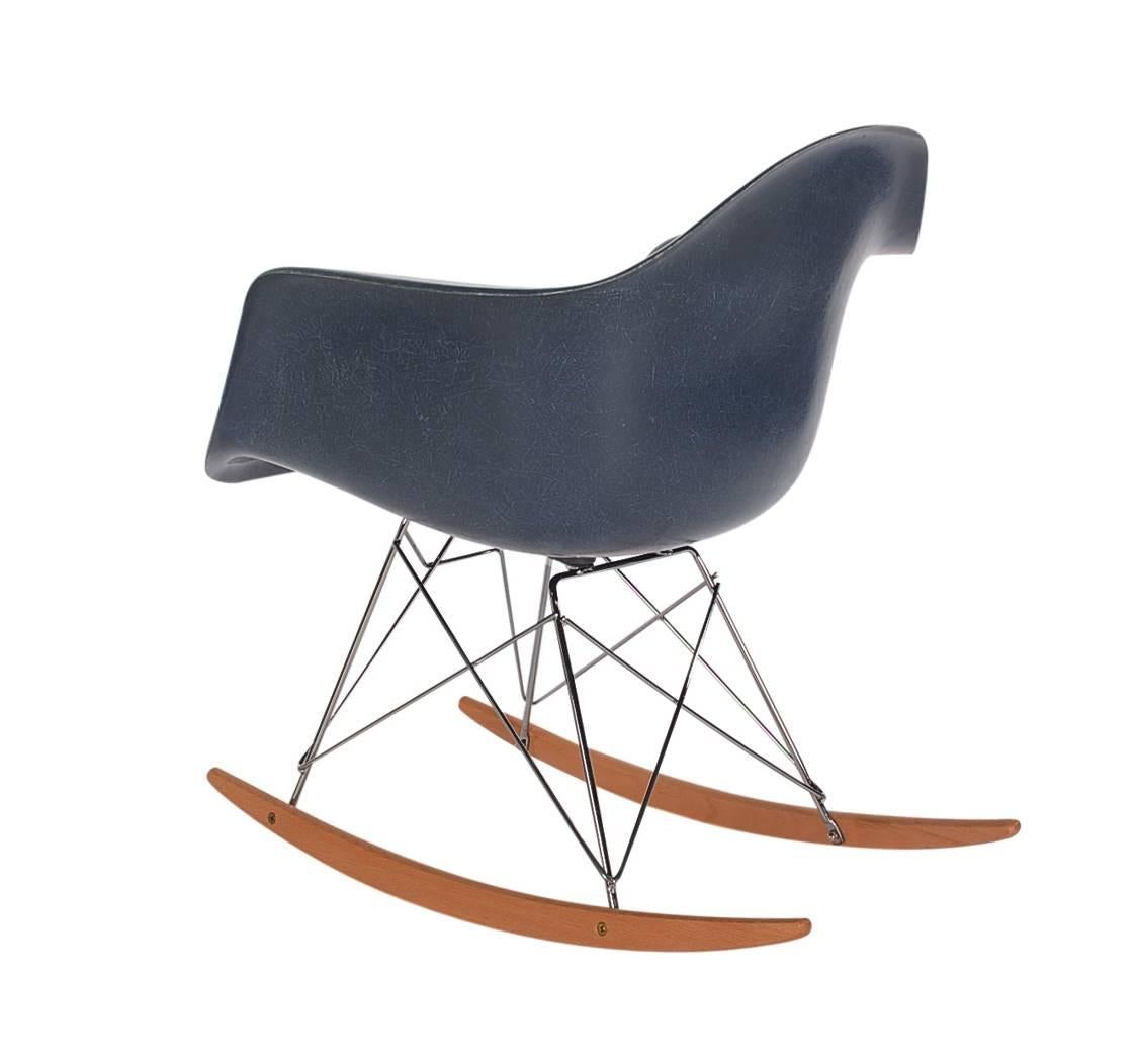 Here we have an iconic design Classic from the Mid-Century Modern period. This vintage fiberglass shell chair was designed by Charles Eames and produced by Herman Miller, circa 1972. Very hard to find navy blue color, or often referred to as