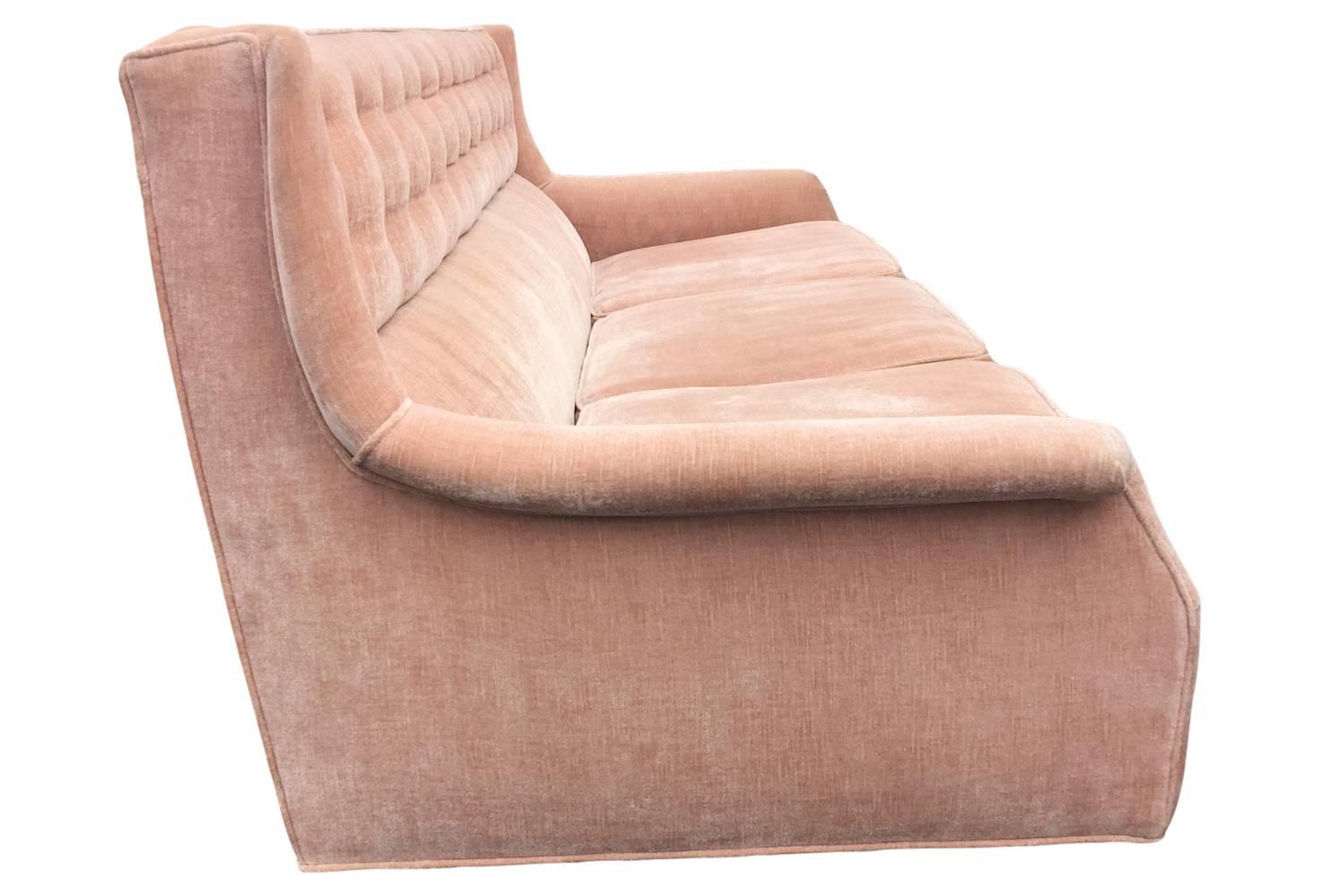 pink tufted couch