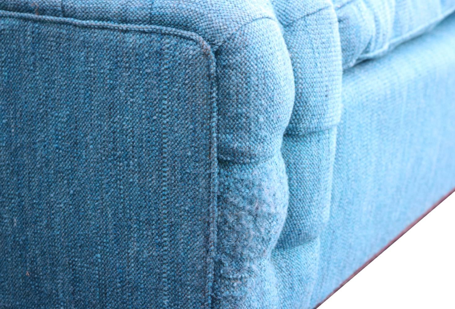 Blue Plinth Based Sofa with Tufted Arms 1