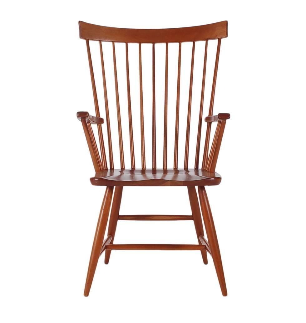 A well-made set of windsor chairs in solid dark cheerywood. Great modern design lines, with saddle seats. 

In the style of George Nakashima.