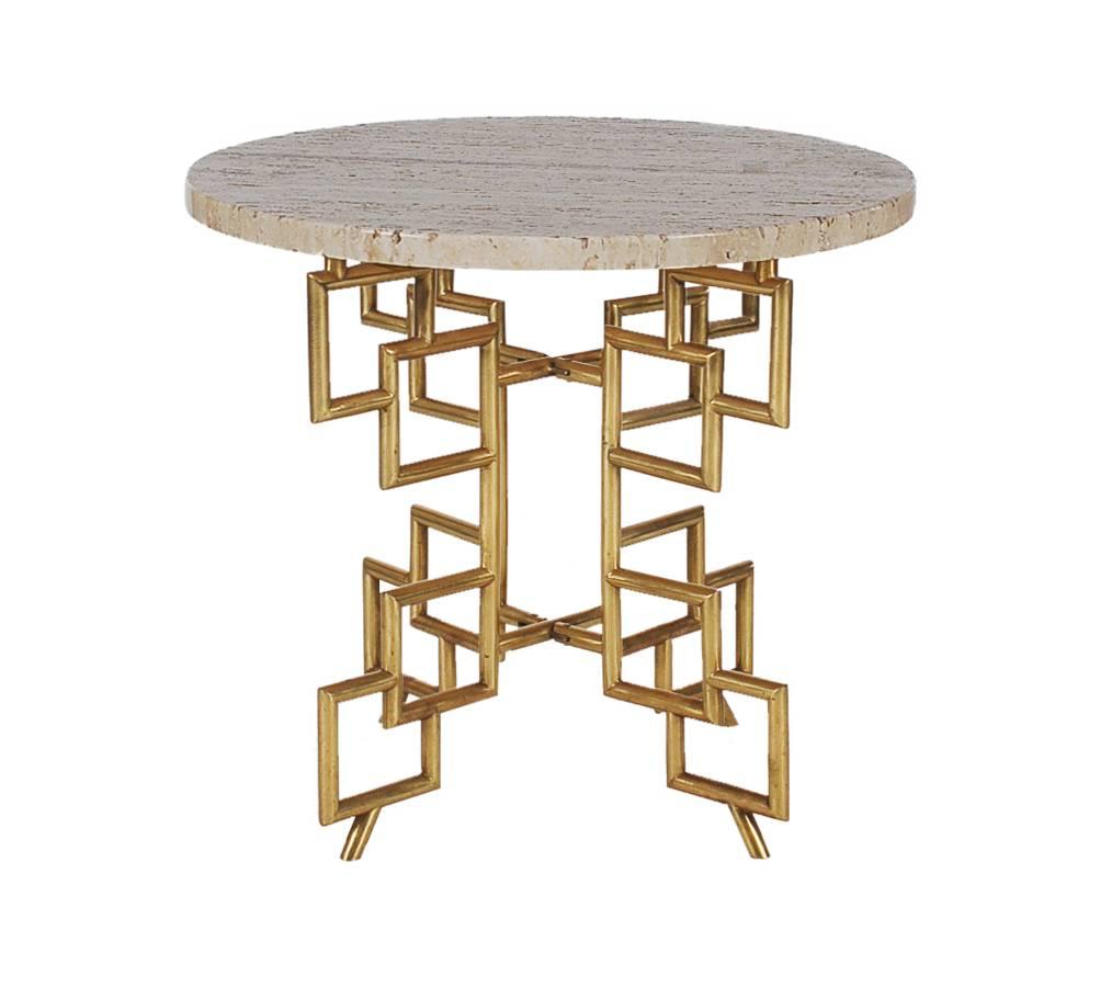 A chic and highly decorative occasional table made in Italy in the 1960s. It features a unique brass base with a heavy round piece of travertine marble.

In the style of: James Mont, Mastercraft and Hollywood Regency.