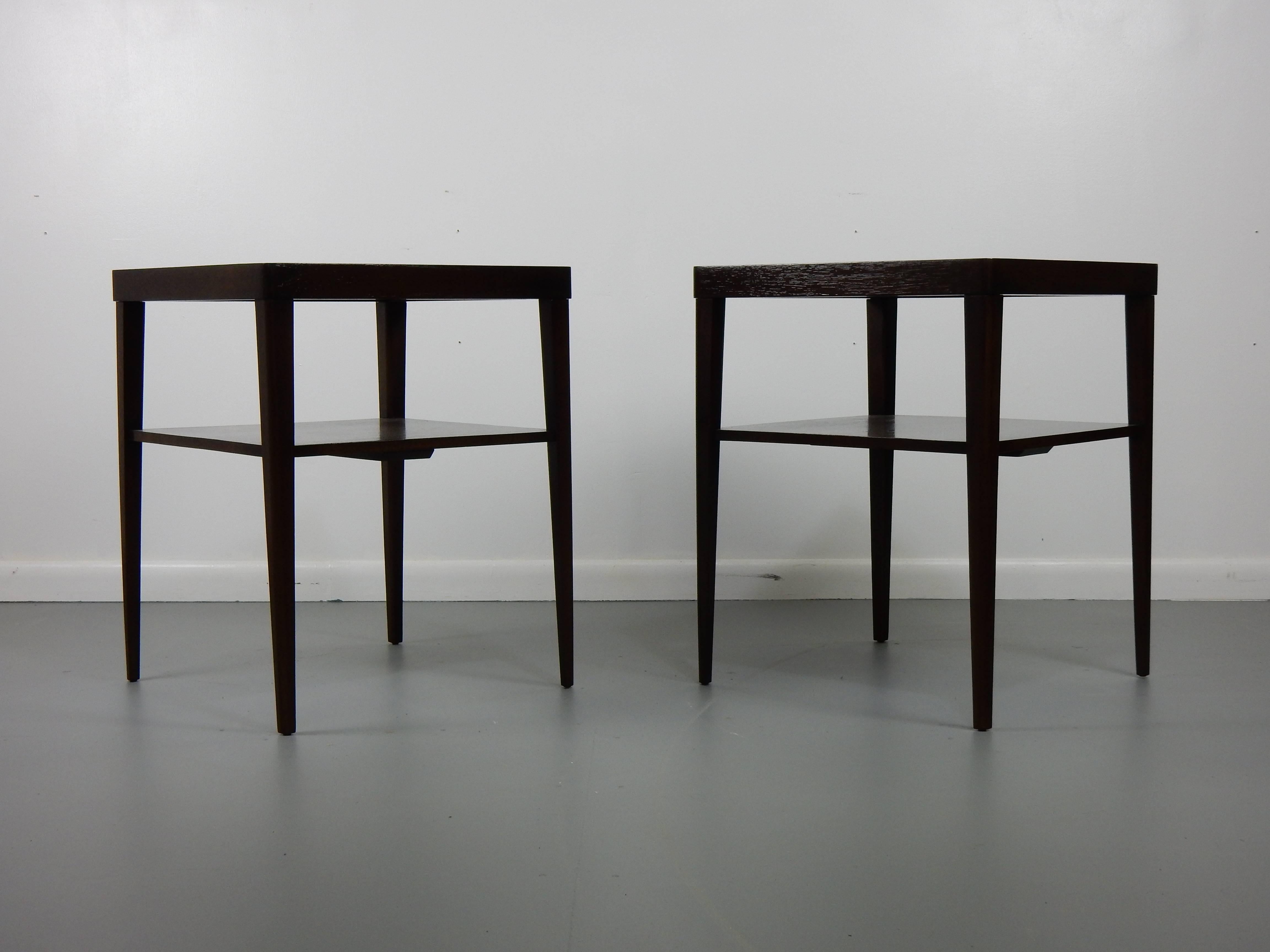 Uncommon side tables in the style of T.H. Robsjohn-Gibbings, refinished in a dark walnut stain. These tables would be useful in many settings as the size makes them so versatile.

Free delivery to NYC.
