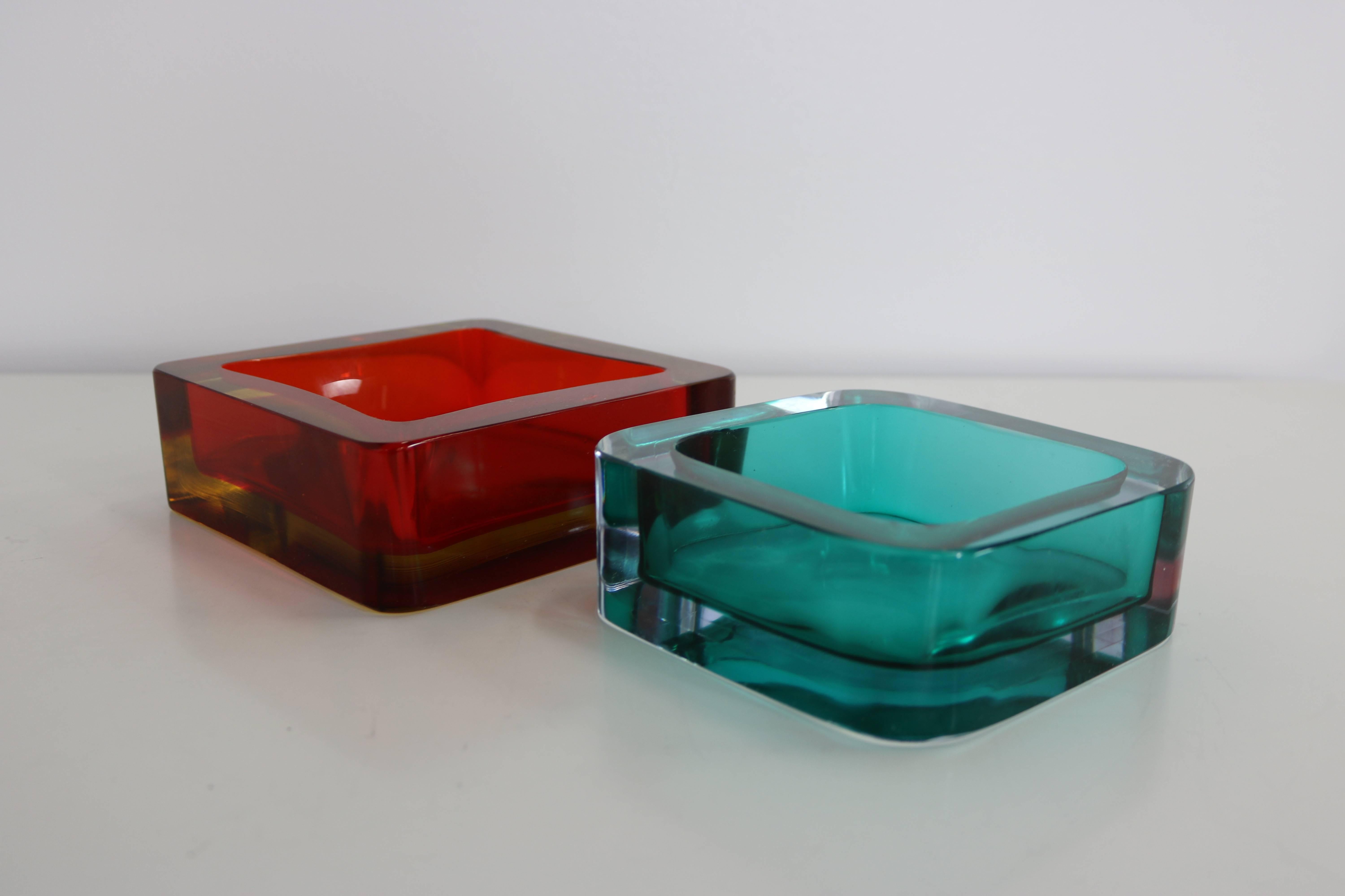 Lovely, brilliant glass dishes in stunning colors. Smaller dish measures 6x6x2 inches.