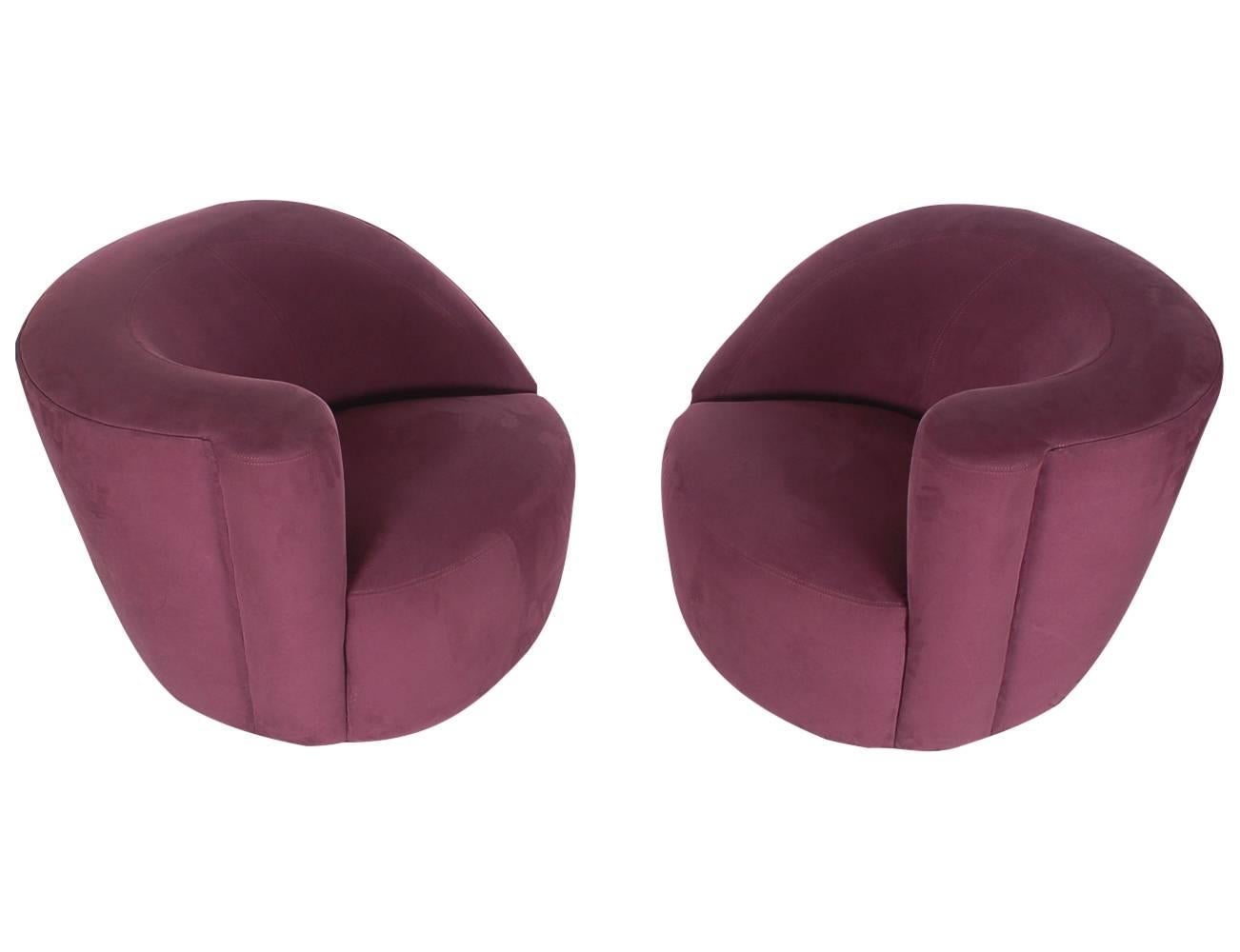 Matching set of "Corkscrew" Nautilus chairs designed by Vladimir Kagan and manufactured by Directional Furniture. They feature the original upholstery from the 1980s, done in dark purple or plum suede. Very comfortable swiveling lounge