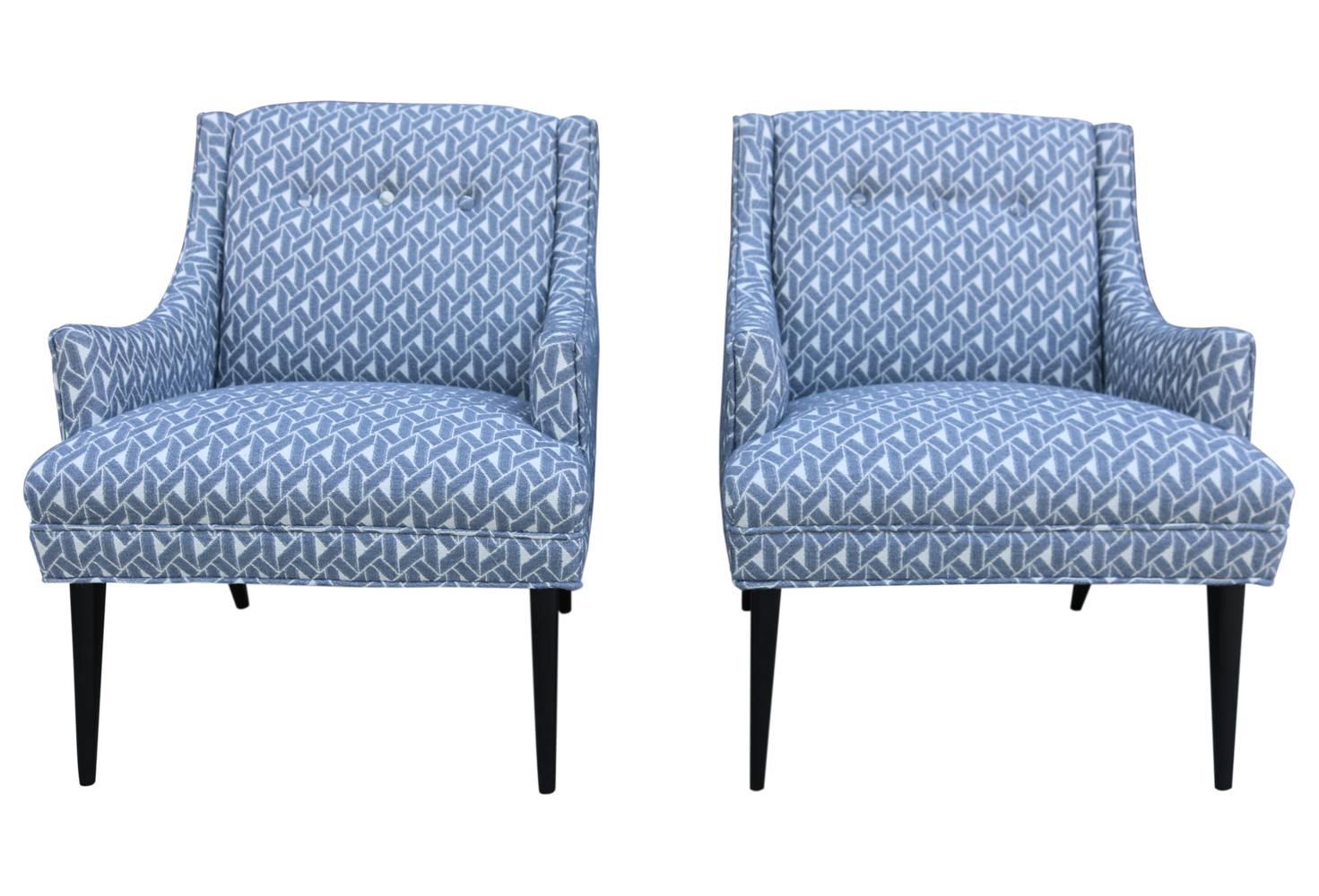 These are adorable, petite and perfect for a cozy space! These Mid-Century armchairs have been lovingly restored, legs ebonized and covered in a lovely, plush geometric fabric.